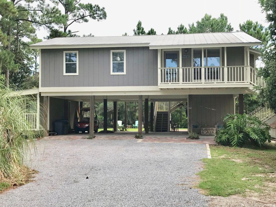 This is the prime example of old Emerald Coast lifestyle. This home is nestled on the quiet setting of Oyster Lake Drive. Located in Flood Zone X, High and Dry! The home has an unobstructed view of Oyster Lake. It features 3 bedrooms and two full baths in the main house and the bunk room serves as an extra bedroom with a full bath. Many creative outdoor living spaces such as a a summer kitchen area an expansive outdoor shower area and others on this little Oasis. You are in walking distance to the beach and or a short bike ride on adjacent bike path or golf cart ride to Gulf Place restaurants. Do not miss this opportunity to own a fantastic property on .35 acres. Home is offered furnished with a few exclusions.