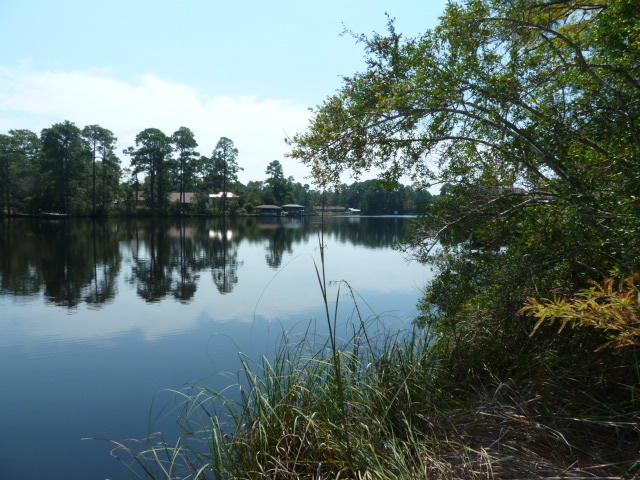 Super location for your new home. Bayou front lot with 80 feet of water front to dock your boat and fish from home. Enjoy the peaceful setting and have the convenience of the beach and the area amenities less than a half hour away. Paved road. City water available. Lot next door available purchase both and have approx. an acre on Mallet Bayou. See mls 746971