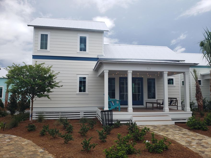 Be among the first to discover this thoughtfully curated and efficiently designed home in a charming ''surf village'' at Margaritaville Beach Cottage Resort in Panama City Beach. The Surf's Up plan lets you connect and gather on your side porch or step inside to explore 760 sf of heated/cooled space perfectly designed to fit your every need. These charming tiny homes feature a bedroom with a king bed and bath on the first floor and a sleeping loft with built-in full over full bunk beds on the 2nd level.