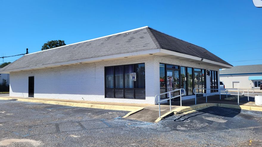 Land area is 0.68 acres with 187' of street frontage and building is 2,776 sqft. Owner plans to move business into a smaller building. Building was originally a McDonalds built in 1960. Presently used as an optometrist eye doctor business. Located next to new 7 Brews Coffee, across the street from McDonalds, Popeyes, Taco Bell, and Tijuana Flats. Within 1 1/2 miles of the Gulf and white sandy beaches.  Do NOT disturb the business or go into the business without prior appointment with listing agent.