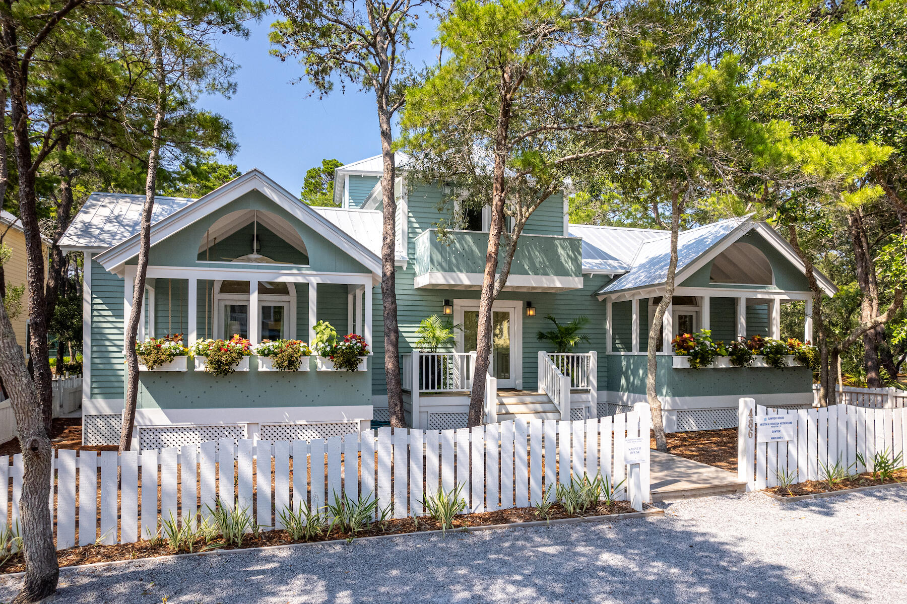 Step Back in Time to a Seaside Classic - the Sawyer House. Capturing the spirit of the carefree early Seaside days, this classic Florida cottage offers a welcoming and friendly presence as it stands comfortably nestled amid the native landscape of live oaks and sand pines. The interiors of this charming cottage with separate guest quarters were recently updated by Tracery Interiors. Located steps from the playground, tennis courts, and swimming pools and is just a short stroll to the emerald waters of the Gulf of Mexico. The large property, measuring 70 by 75 feet, offers incredible flexibility for expansion. Like many of the best early Seaside homes, the rich traditions of vernacular architecture found in historic small towns and older beach communities inspired the original design of