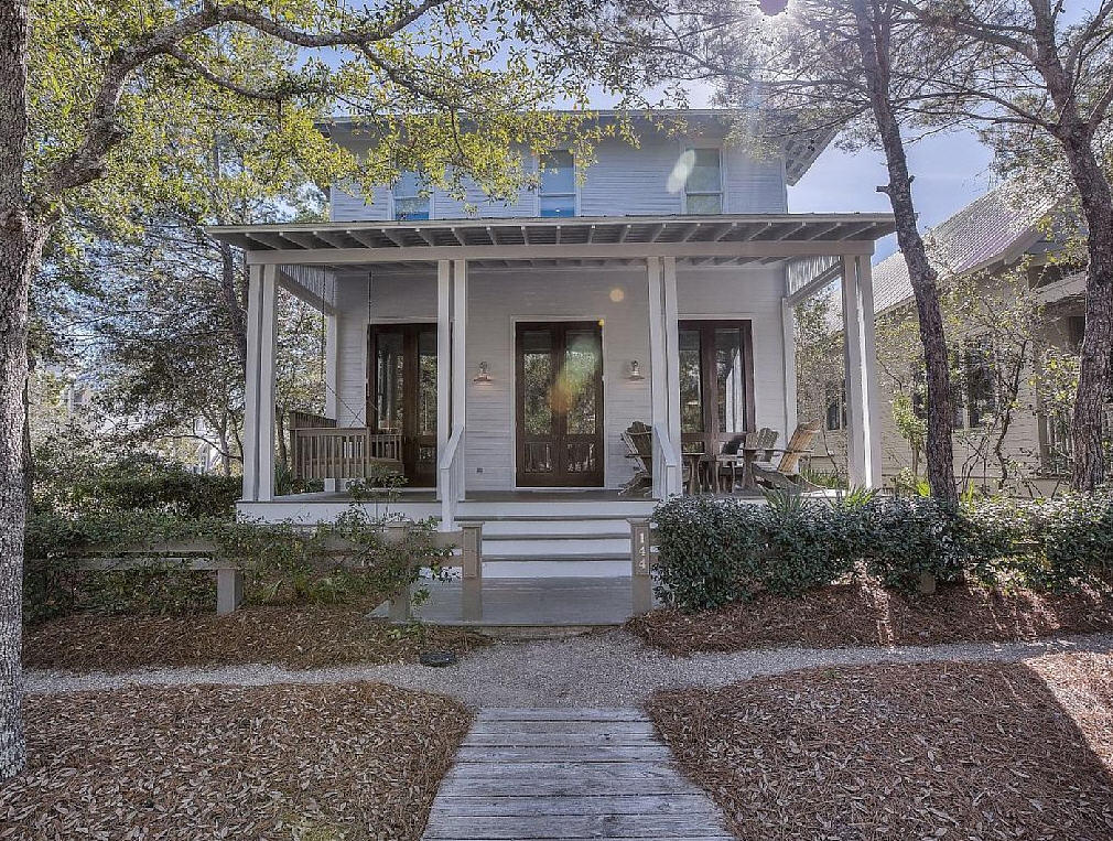FURNISHED & professionally decorated 4 Bedroom/ 4.5 bath home has recently been remodeled with a beautiful Contemporary Coastal design. This residence boasts a spacious main home plus a cozy carriage house with a 2 car garage and located just a short walk to the beach. Tucked away on a large corner lot in WaterColor's Phase I, this exceptional property is Coastal living at its finest and the perfect 30A retreat. The main residence's 1st floor is great for entertaining with a notable kitchen leading to a spacious living area with soaring ceilings, floor to ceiling windows, hardwood floors, a cozy fireplace and two dining areas. It's large and inviting sitting porches allow you to take in the beautiful surroundings.