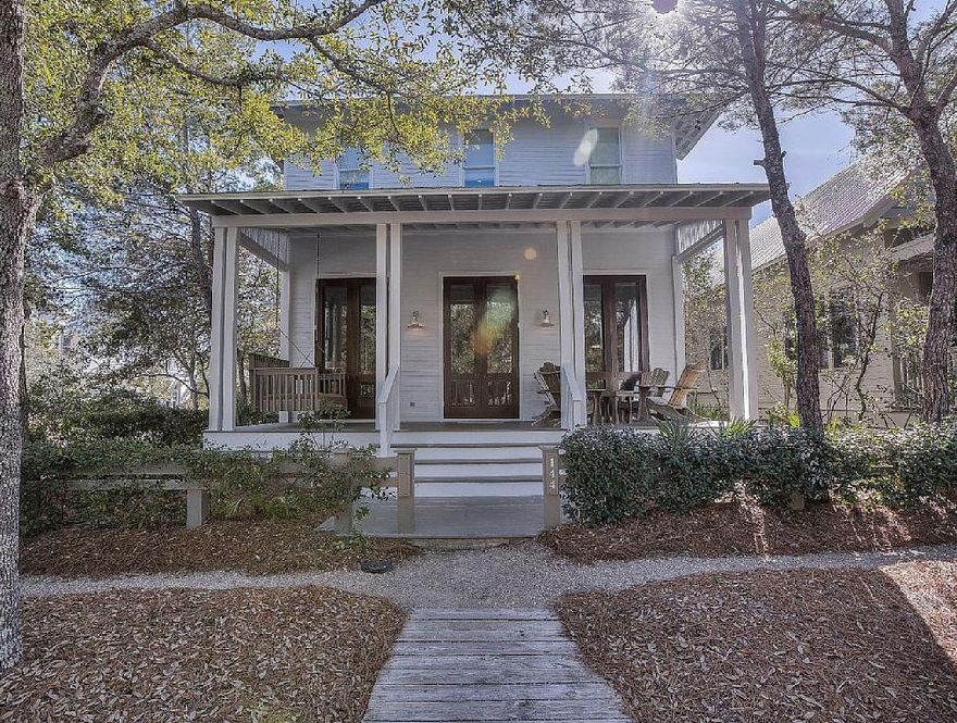 FURNISHED & professionally decorated 4 Bedroom/ 4.5 bath home has recently been remodeled with a beautiful Contemporary Coastal design. This residence boasts a spacious main home plus a cozy carriage house with a 2 car garage and located just a short walk to the beach. Tucked away on a large corner lot in WaterColor's Phase I, this exceptional property is Coastal living at its finest and the perfect 30A retreat. The main residence's 1st floor is great for entertaining with a notable kitchen leading to a spacious living area with soaring ceilings, floor to ceiling windows, hardwood floors, a cozy fireplace and two dining areas. It's large and inviting sitting porches allow you to take in the beautiful surroundings.