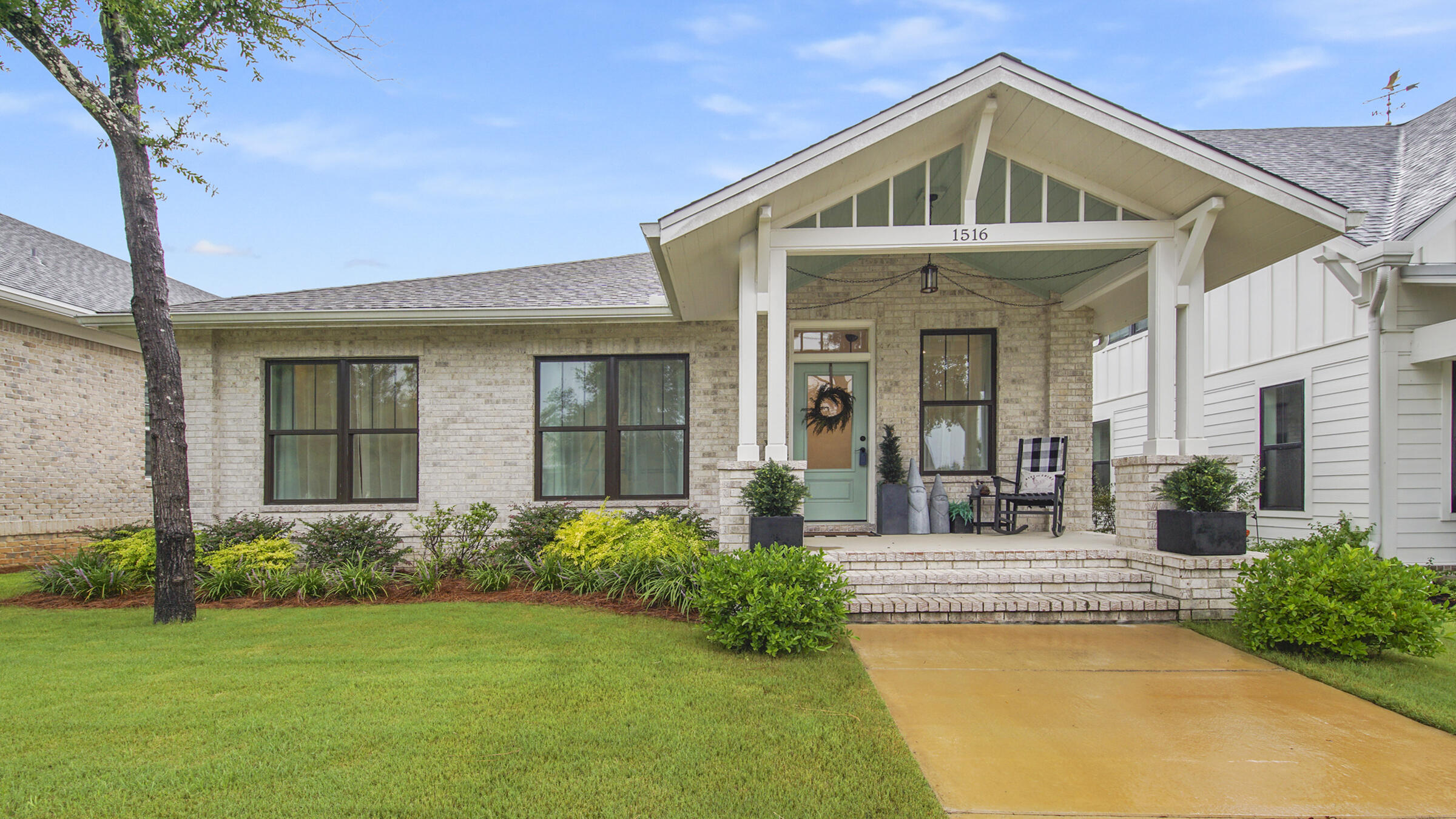 Don't miss this rare opportunity in Deer Moss Creek for under $500k! This immaculate custom-designed home features gorgeous modern finishes, high ceilings, amazing master bathroom w/ overhead rain shower & freestanding soaking tub, huge walk-in master closet, custom shelving, private outdoor paver courtyard, all LED lighting, & so much more! The 825 sq. ft. insulated/air-conditioned/finished 3 car garage w/ a 6,000 lb. built-in vehicle frame scissor lift also has room for a workshop & weight lifting area with TV. Deer Moss Creek is a beautiful growing community with paved nature walking/biking trails, scenic parks, future plans for a pool & community building, community Holiday events and back-road access to HWY 293 (Mid-Bay Bridge). Call today to schedule a private showing!