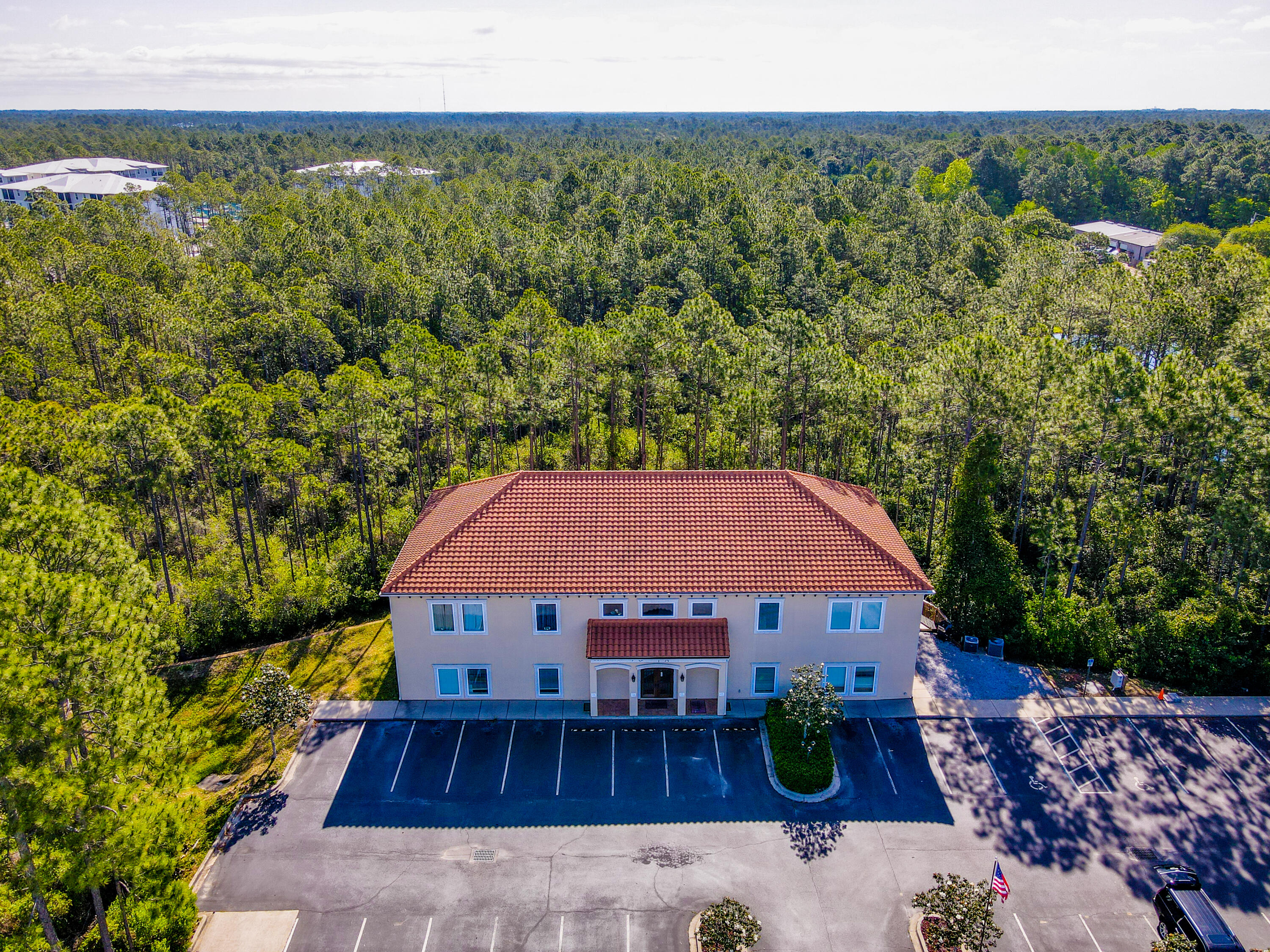 Property has been used as an owner-occupied building with rental units on the second floor. This is a great location for professionals. Property is centrally located in Santa Rosa Beach.  Two story building with an elevator.