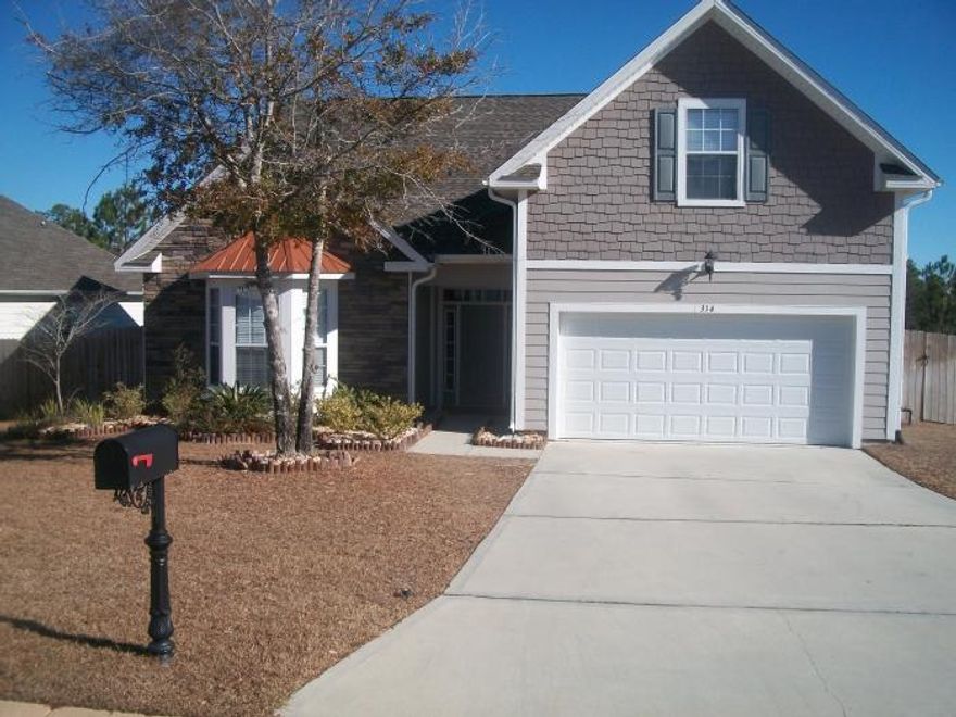 Start your new year in your own home! This 4bd, 2ba beautiful floor plan features an open kitchen / dining / living area with breakfast bar and sunroom. The large master suite with trey ceiling offers a separate shower and garden tub, walk in closet. Two bedrooms and bath on the main floor and a bonus bedroom or ''man cave'' upstairs. Located south of I-10 in a quiet cul de sac. Seller pays most closing costs. See it today!