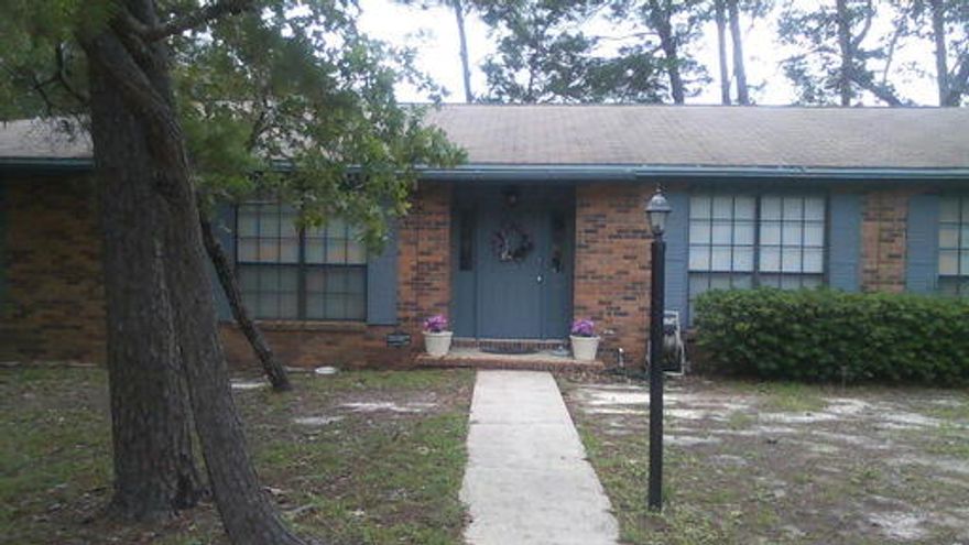 Spacious Bluewater Bay home located on a large corner lot. This fine home features two living areas, large laundry room with half bath, fenced back yard and a two car side entry garage. Wood burning fireplace in the family room located just off the kitchen.