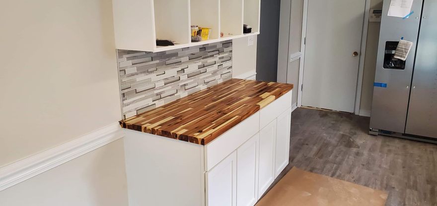 New Photos Soon! 95% Done. Will be 100% by Tuesday at latest. New Roof 2021, Newer HVAC 2019, Home has been completely updated....Updated Kitchen and baths, Updated floors, New Laminate flooring, new lights and fans with helicopter fan in living room.. New Carpets Bedrooms, New Stainless Steel Appliances, New   New Shower Trim kits on order.. Sod will be next week Partial sod as needed.