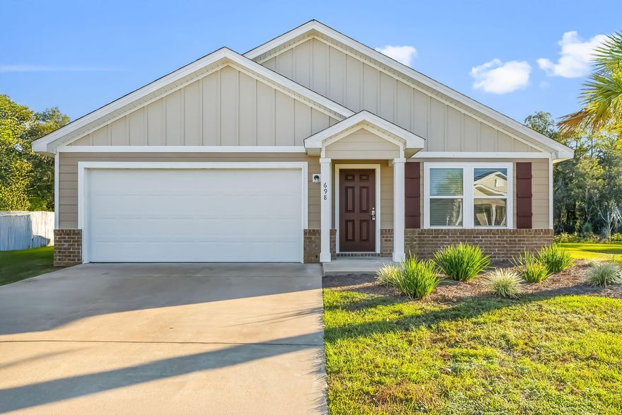 Welcome home to this beautiful single-story residence in the desirable Cross Creek neighborhood of Freeport. Offering 1,607 square feet of thoughtfully designed living space, This home features 4 bedrooms, 2 bathrooms, and a 2-car garage. Inside, you will find granite countertops, a full appliance package including stove, refrigerator, microwave, and dishwasher, plus valuable after-construction upgrades such as luxury vinyl plank flooring throughout and custom window treatments. The back patio and spacious backyard back up to a peaceful wooded area, providing privacy and a relaxing outdoor setting.Cross Creek is known for its quiet, friendly atmosphere while still being conveniently located near Freeport's excellent schools, town center, churches, shopping, and more.