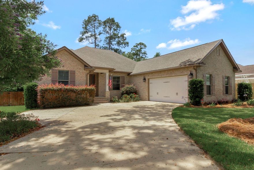 Welcome to your dream home in the heart of Niceville! Nestled on a large cul-de-sac lot beneath a canopy of ancient oak trees, this thoughtfully designed custom home by Key Lime Construction, LLC offers luxury, functionality, and timeless style in every detail.Boasting a triple-split floorplan, this home provides both privacy and versatility. A bedroom and full bath are tucked just off the front foyer--perfect for guests or a private office--while two additional bedrooms and a full bath are located at the rear of the home, discreetly separated from the main living space by a pocket door. The spacious primary suite is set apart on the opposite side of the house and features a serene retreat complete with a large walk-in closet, dual vanities, an oversized custom- tiled shower, and a separate water closet.

The open-concept living area is warm and inviting with wood-look tile, recessed dimmable lighting, and a smart layout perfect for entertaining or everyday comfort. At the heart of the home, the kitchen stuns with a large central island, Kenmore Elite appliances including a gas range, a walk-in pantry with custom wood shelving, under-cabinet lighting, and elegant Avanti Shaker Legacy cabinetry with 42" uppers. For dining options, relax in the charming breakfast nook, dine at the kitchen island or create a formal dining experience in the flexible bonus space separated by frosted glass pocket doors. This space would also make an incredible media room, home gym, or private office!

Step outside to enjoy the screened-in porch and expansive open deck, ideal for grilling, entertaining, or relaxing while overlooking the generously sized, privacy-fenced backyard with ample room for a future pool.

The oversized garage includes an additional 200+ sq ft of flexible space for your workout equipment, workshop needs, or outdoor adventure gear. Every detail in this home has been meticulously curated, including:

5 1/4" baseboards and 5" crown molding

Sound-control insulation in interior walls

Upgraded media wiring throughout

Four exterior hose bibs

Gas plumbing to the back porch for your grill

Soffit outlets for effortless holiday lighting

Gutters with leaf guards

All this, ideally located in the peaceful Huntington Estates, where you're tucked away in a quiet neighborhood yet just minutes from schools, shopping, dining, Eglin AFB, and the Emerald Coast's white sandy beaches.

Don't miss this rare opportunity to own a true custom-built gem in one of Niceville's most desirable neighborhoods. Schedule your private showing today!