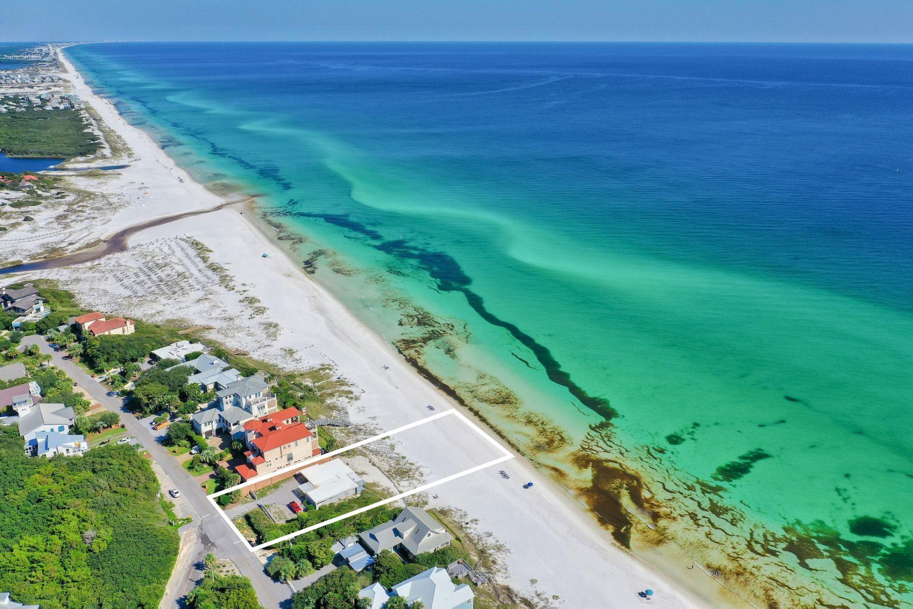 Prime legacy building site yielding approximately 75' x 253' directly on the beach perched at an impressive elevation presiding over unparalleled gulf vistas located on the coveted east side of Blue Mountain Beach Road along Scenic Highway 30A. This highly sought after location is one of the most opportunistic on 30A with an exceptional site layout to yield a spectacular finished product complete with underground power (no power lines) and a 50' vertical heigh limit situated on 80 linear feet of pristine white sand beach on the Gulf of Mexico. This premium site has a seawall currently intact and a small block beach house complete with 4 bedrooms, two living rooms and a carport that could provide temporary use while designing a permanent residence.