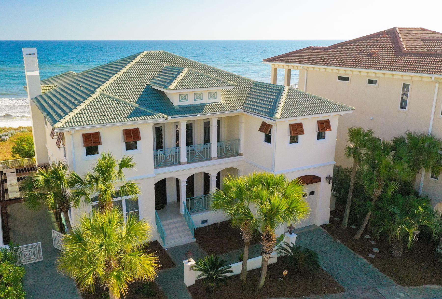 Life doesn't get much better than living on the Gulf of Mexico, and beach homes don't get much better than this stately mansion bordering the pearl white sands and overlooking the emerald green waters. The boardwalk begins at the back deck and ends where your toes meet the sand. Beyond its incredible location, this elegant two-story, five-bedroom, five-and-one-half bath home has been impeccably maintained by the original owners. All new decking, new beach walkover and recent exterior paint ensure a turnkey transaction.The glorious front door was moved here from a French chateau. The home has surround sound inside, an elevator, attached garage and storm shutters on all the gulf-front windows. Located in a