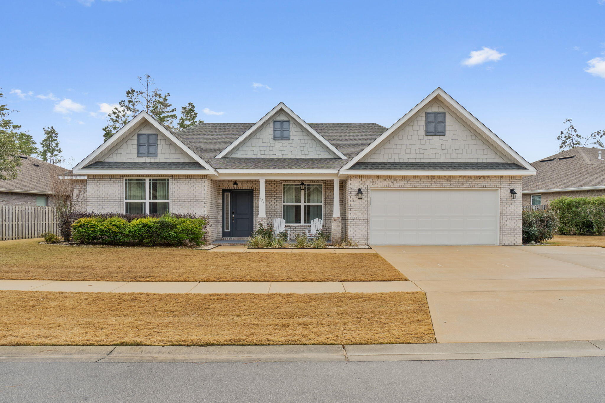 Introducing this splendid BEAUFORT model home by Holiday Builders, encompassing 2850 SF of tastefully appointed living space. Nestled in the dynamic Hammock Bay community in Freeport, Florida, this home features 4 spacious bedrooms, 3 full baths, extended driveway and is a true embodiment of comfort and elegance.Upon entering from the inviting covered front porch, the expansive foyer unfolds into an impressive dining room and a multi-purpose living room/office. The heart of the home is the 20'x17' family room, aglow with natural light streaming through a plethora of windows, and opens to a well-equipped kitchen. This culinary space is complete with granite countertops, an island, and sophisticated 42'' cabinets.A significant enhancement is the newly added screened-in pool...