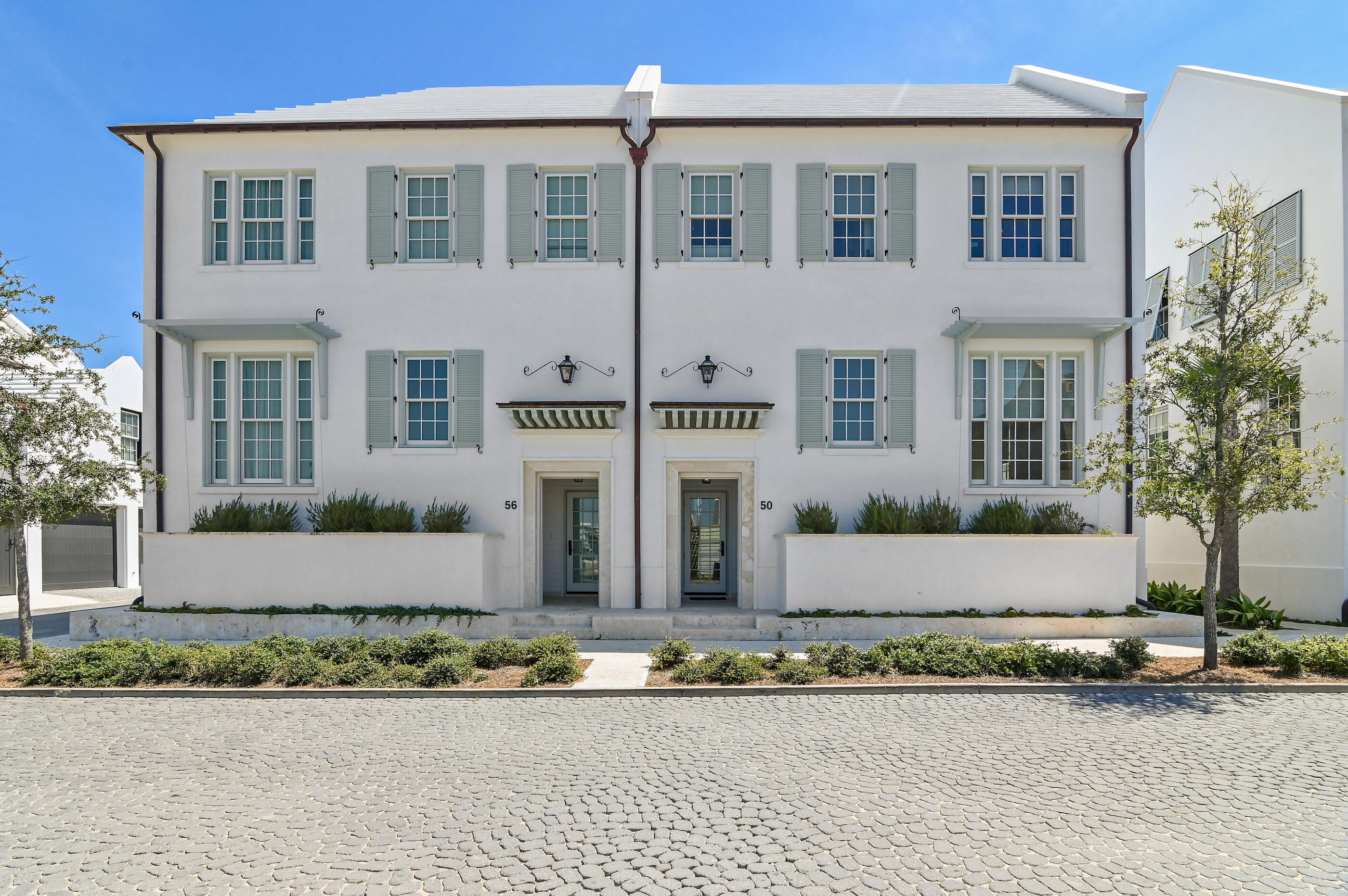 Welcome to 50 N Sea Garden Street, a stunning retreat in the heart of Alys Beach. Designed with timeless Bermudan-inspired architecture, this residence combines elegant coastal living with thoughtful details throughout. The open-concept layout is anchored by soaring ceilings, natural light, and seamless indoor-outdoor flow. This beautiful residence offers a sought after first floor master suite as well as two private guest suites on the second level. A spacious great room spans the width of the home and boasts a 16 foot tall ceiling which adds scale and grandeur.Step outside the great room to a private courtyard with pool which is attached to a covered loggia with an additional guest suite and enclosed 2-car garage. The gourmet kitchen features premium appliances, custom cabinetry, and a spacious island perfect for gathering. Multiple living areas provide both privacy and connection, while the well-appointed bedrooms offer comfort and tranquility for family and guests. The private pool, covered loggias, and serene outdoor spaces offer relaxation and space for entertaining. Located in iconic Alys Beach, owners enjoy pedestrian-friendly streets, exclusive homeowner amenities including an exclusive beach club and state of the art fitness facility, and numerous boutiques and restaurants. Enjoy an unparalleled lifestyle on 30A!