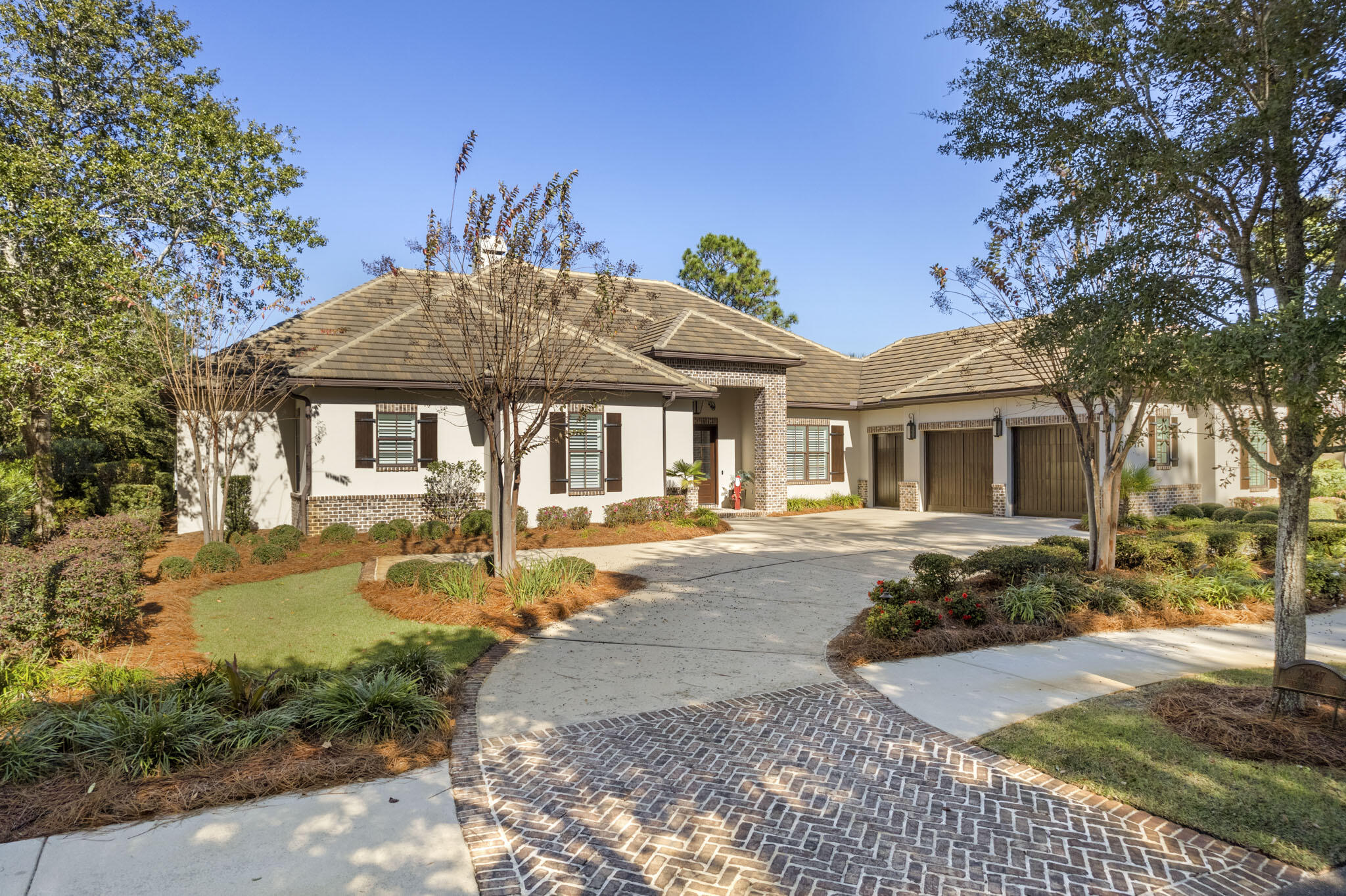Beautiful custom built, lakefront residence overlooking the Burnt Pine Golf Course inside the gates of Sandestin. This stunning, quality home is ALL ON ONE LEVEL! Peaceful, serene views from this truly special offering, perfectly situated on 110 feet of lake front property. The Spacious Master Suite opens to a separate screened outdoor living space. Chef's dream kitchen and main living area also open to screened outdoor areas, perfect for maximizing views and for entertaining year around. Summer kitchen, Impressive wine room, separate dining room, separate study with built in desks for two, butler's pantry, cypress ceilings and ample storage are just a few of the many features found within this lovely home. Includes a golf cart, and is offered furnished with just a few exceptions.