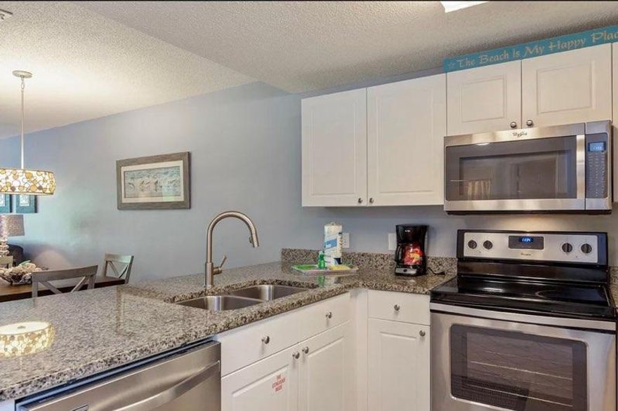 Ground floor, Across from the Beach 2BR/2BA unit in desired and Pet Friendly Ciboney Condo, Now Available! Updated in 2019-2020 with fresh paint, LVP flooring, furniture and decor this condo offers spacious living/dining room area, separate room with a full size laundry and a large patio with grassy area to enjoy and relax after a long day at the beach. Ciboney Condo is offering Deeded Beach Access, Pool, Tennis court, BBQ area and fenced dog park as well as elevators and plenty of parking space. HVAC-2020, Water Heater-2015, Kitchen Appliances-2017. Come see it today! Showings to begin April 1s.  Buyer, Buyer's agent to verify all details!