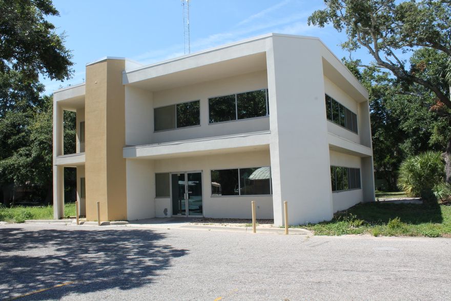 Super location in the middle of Ft Walton Beach -- with an average daily traffic count of 36,500!! Over 200' of Hwy 98 frontage. This two story building has 2824 sf h/c, in very good condition with multiple offices and work stations; plus a large common work area on each level. There is a separate entrance to the 2nd floor. The property could be income producing while plans and permitting are being done for other uses of the property...