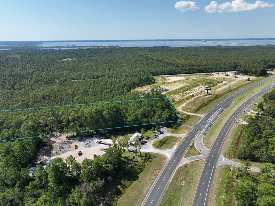 Positioned along the highly traveled S US Highway 331 corridor in Freeport, this 4.28+/- acre parcel presents a rare opportunity with exceptional growth potential. Located directly adjacent to a major new development planned at the intersection of Highway 331 and State Road 3280, the property is poised to benefit from significant future traffic and activity.Adding to the momentum, Walmart has recently secured a nearby site for a new superstore, a catalyst that will draw even more daily traffic and anchor retail demand in the area. The property also features an existing highway cutout, providing convenient direct access from 331. Just minutes north of the famed Scenic Highway 30A and its world-class beaches, this parcel offers both visibility and connectivitymaking it ideal for a variety of future uses. While currently zoned Rural Village, neighboring properties are designated Light Industrial and General Commercial, signaling the area's shift toward commercial expansion and development.
This tract combines frontage, accessibility, and proximity to one of Florida's fastest-growing coastal marketsan opportunity for investors and developers to position themselves at the forefront of Freeport's next wave of growth.