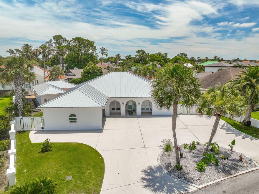 Canal-front home in Bay Point gated community. Concrete constructed with hurricane windows and doors!!  New Appliances, New 17,000 pound Boat Lift, New Pool Equipment, New HVAC, New tankless water heater, New Dual Fuel backup generator system and New Metal Roof and gutters.4 Bedroom 3.5 Bath, large pool, mother-in-law suite and 2 car garage, driveway with plenty of parking. Spacious floor plan. Kitchen with large counter and lots of cabinets. Dining , den area , living room w/fireplace all have pool/canal view. Master bedroom has fireplace, large closet and separate office area . Master bathroom has tile Shower and double vanities. Additional bedrooms with Jack and Jill bath. Mother-in-law suite has large living space, full bath, closets, counter/shelving. All dimensions are +/-