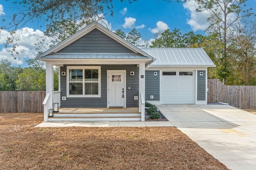 Welcome to a truly unique CUSTOM Florida cottage you won't find anywhere else! This 3 bedroom, 2 full bath home blends coastal charm with modern convenience, offering a FULLY FURNISHED, MOVE-IN READY retreat in Defuniak Springs. Step inside to discover vaulted ceiling's, laminate flooring throughout, and tons of natural light. The open-concept layout seamlessly connects the living room and kitchen area making it perfect for entertaining or unwinding. The kitchen sports an 8ft x 8ft Island with quartz countertops and storage underneath on both sides. Bathrooms have tiled showers and double vanities with quartz countertops as well. But the true gem of this home? THE MASSIVE BACKYARD. Whether you're hosting summer gatherings, enjoying your pool, or your evenings by the fire pit, this backyard oasis is your private slice of paradise. Be sure to schedule a showing for this beautiful home because pictures just don't do it justice.