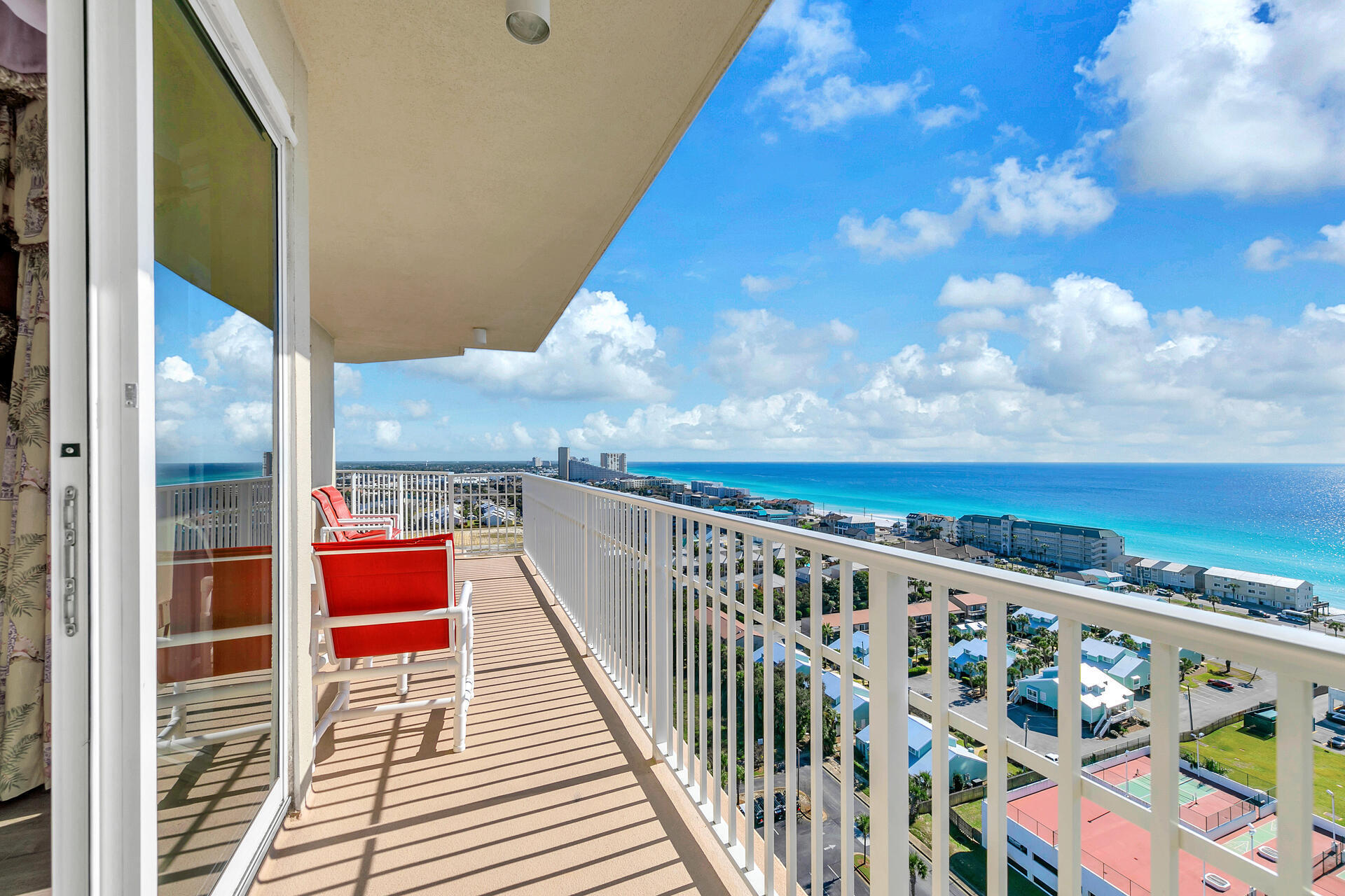 Ariel Dunes Unit 1801 is a luxurious 3-bedroom, 3-bathroom Gulf-view condo in the heart of Miramar Beach, designed for comfort and relaxation. With a spacious layout, this condo can comfortably accommodate, making it perfect for families or groups of friends. Step onto the private 18th-floor balcony and take in the sweeping views of the emerald waters and sugar-white sands of the Gulf. This is the perfect spot to enjoy your morning coffee, watch the sunset, or share a meal at the outdoor dining table. Inside, the open-concept living area is furnished with plush seating and, providing a cozy space to unwind after a day at the beach. Ariel Dunes is a premier condo community located within the expansive Seascape Resort. Known for its sweeping Gulf views and top-tier amenities, the property is perfect for families and groups looking for a relaxing yet activity-packed getaway. The resort offers 300 acres of lushly landscaped grounds, featuring walking trails, golf courses, tennis courts, and a variety of pools. Its proximity to Miramar Beach ensures you're just steps away from the emerald waters and powdery white sands that make this region a favorite destination.