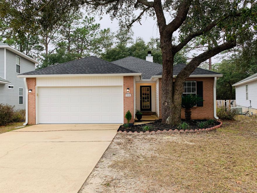 Beautiful MOVE IN Ready Home with extensive renovations! Conveniently located in the quaint Whitepoint Village, just off the Mid-Bay Bridge, giving you quick access to shopping and the Destin beaches. Renovations include: New Roof, All New Kitchen Cabinetry, Granite Countertops with Undermount sinks in Kitchen and Baths, & Stainless Appliances. In addition, you will also enjoy Sparkling New Sliding Glass Doors from the Dining room that overlook a New Deck for entertaining and a back yard which backs up to the protected woodlands! Luxury Vinyl Plank flooring has been installed, which carries you through the entire , Freshly Painted home. A New A/C Unit has been installed and the Garage has been fully renovated to include: Fresh paint on walls & floor, new door & opener. Must See!!