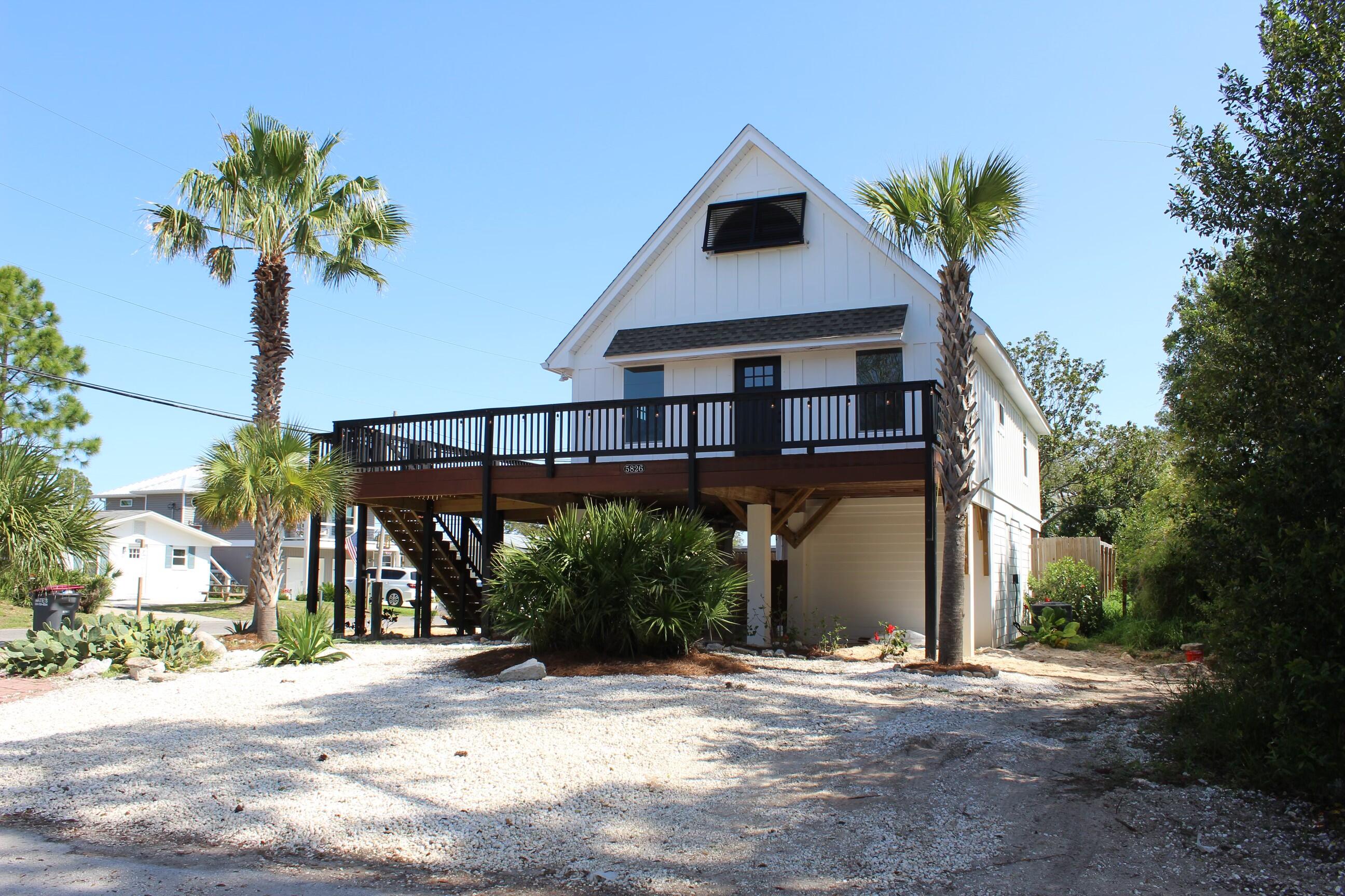 Charming beach house with stunning deck views of the Bay. This 3bed/3bath home is 226 feet to the Dolphin boat ramp and 4 blocks away from the Gulf of Mexico. A fully-fenced in backyard allows enough room to add a pool or park your boat. There are two storage units below the house. Hilltop has 200-amp service, more than adequate to service lower level storage units, already wired, stubbed for bathroom and ready to finish for extra income. Zoned for short-term/long-term rentals. This house boasts upgrades within the past year. A new roof, new cement pylons, new batten board siding, new hurricane shutter and impact windows, new HVAC, new water heater & crown molding in the kitchen!Buyer to verify all information regarding property**