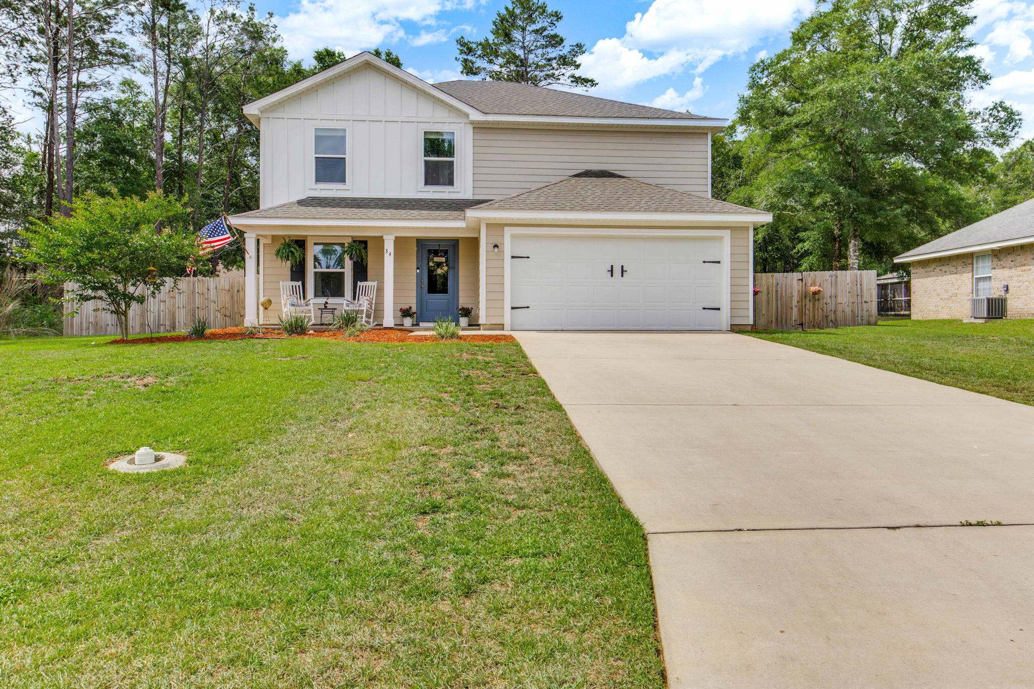 Must see 5 bedroom 3 bath Craftsman home located just minutes from downtown Defuniak Springs! This home was recently built in 2022 and is located in Magnolia Lake subdivision. This two story home offers a blend of elevated finishes, flexible spaces, and a backyard oasis that sets it apart. The exterior stuns with its classic board-and-batten detail, inviting front porch, and clean architectural lines, offering instant curb appeal. Inside, the main level features a versatile bonus room that can easily flex as a formal dining room, office, or playroom tailored to fit your lifestyle! At the heart of the home, you will love the open concept living. The kitchen features stainless steel appliances, white subway tile backsplash, a large pantry, and bar seating for casual dining. The kitchen open s up to your eat in dining area and living room. Downstairs you will also find a private guest suite with full bath access just off the living room which is perfect for visitors. Upstairs, the spacious primary suite offers a double vanity, walk in shower, and a generous walk in closet. You'll also find three additional bedrooms, each with its own walk-in closet, providing plenty of space for family, guests, or a home office setup. A second full bathroom with thoughtful finishes completes the upper level. Step outside and you'll find one of the home's most impressive features for outdoor living: a fully fenced backyard, a custom-covered pavilion and patio, and a built in firepit area. Situated on a 0.24-acre lot, the property offers plenty of room to enjoy the outdoors while maintaining easy upkeep. Additional highlights include a 2 car garage, a laundry room, and a layout designed for both beauty and practicality. All this, just minutes from the Defuniak Lakeyard, weekend farmers markets, local restaurants, and charming boutiques that define the DeFuniak lifestyle. Don't miss this incredible opportunity, schedule your showing today!