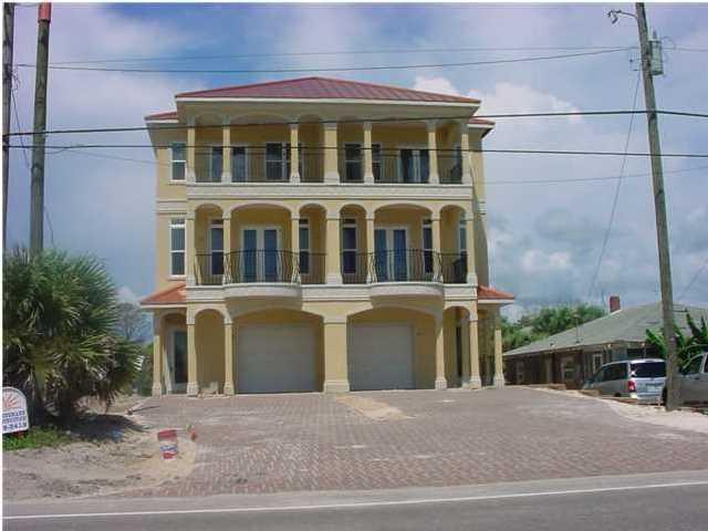 GULF VIEWS! Villa style duplex with unobstructed gulf views in Sunnyside Beach. Convenience west end Panama City Beach location. Upscale interior finishes. Enjoy magnificent sunsets from your covered porches. Nice backyard with plenty of room for a pool. For your convenience, garage, elevator and nice covered porch areas on each floor. Room dimensions are approximate.