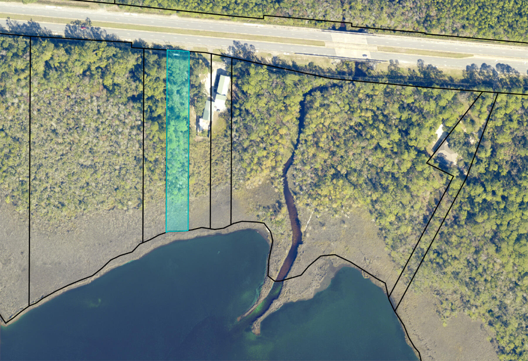 Prime Bay Front Vacant Land North of Navarre Beach! Discover the beauty and potential of this 1.17-acre property north of the Beach. This stunning land awaits your dream home, with breathtaking bay views and direct access to calm, clear waters perfect for boating, fishing, or relaxing.With ample space, design a home that suits your lifestyle, from a sizable home to a cozy beach cottage. Enjoy peace and privacy while being minutes from vibrant Navarre Beach, renowned for its sugar-white sand and emerald waters.A haven for outdoor enthusiasts, this location offers nearby nature trails, water sports, and diverse wildlife. This property is an excellent investment opportunity. Embrace your dream lifestyle and make this exceptional lifestyle and make this exceptional property yours today.