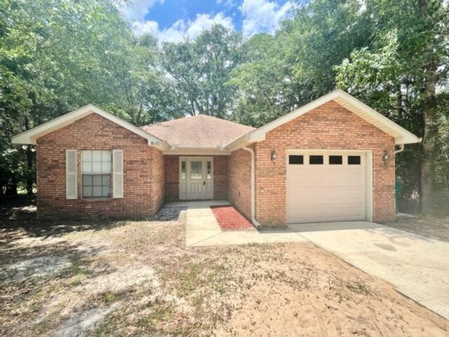 Nice 3 bedroom home featuring cathedral ceilings, inside utility room & a split bedroom plan for extra privacy. Kitchen has stainless steel appliances & a pantry. Great master suite w/ trayed ceilings & wood flooring in the bedroom & a jacuzzi tub, double vanity sinks, walk in closet & tile flooring in the bathroom. You have access to your back deck & large privacy fenced backyard from the dining area & master bedroom. Additional bedrooms also have trayed ceilings & carpet flooring. All electric! 1 car garage w/ an auto opener & pull down stairs/attic storage. Home also features a security system. Septic tank was just pumped 5/31/22. Home was professionally cleaned, carpets cleaned, exterior pressure washed & is move in ready for you! Welcome home!