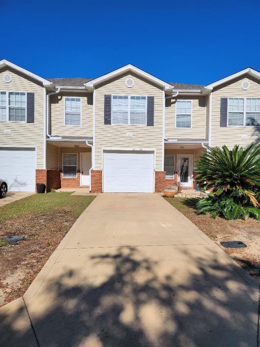 WONDERFUL 2-STORY TOWNHOUSE WITH LOTS OF SPECIAL FEATURES. THE EXTERIOR IS WORRY-FREE VINYL AND BRICK WITH DIMENSIONAL SHINGLED ROOF. ENERGY EFFICIENT ALL ELECTRIC. CEILING FANS IN THE LIVING ROOM AND BEDROOMS. SPACIOUS ROOMS THROUGHOUT. NICE KITCHEN HAS SOLID SURFACE COUNTERS, UNDER-MOUNT SINK, BREAKFAST BAR, LOTS OF OAK CABINETS, AND A BUILT-IN-MICROWAVE OVER THE STOVE. TILE FLOORS IN THE FOYER, HALL KITCHEN & BATHS, CARPET EVERYWHERE ELSE. HALF BATH WITH PEDESTAL SINK AND PRETTY MIRROR FOR YOUR GUESTS. MASTER SUITE HAS A WALK IN CLOSET AND DUAL VANITIES IN THE BATH. INSIDE LAUNDRY. PATIO IN THE BACKYARD. 1-CAR GARAGE