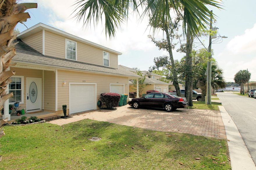 Hurry and grab this sunny and bright 3 bedroom, 2 and 1/2 bath town home with oversized 1 car garage, covered front porch, pavered driceway and pavered back patio. Just a short walk to the beautiful bayou, boat launch park and waterfront dining. Located in central Niceville just minutes from Eglin AFB and a short dirve to the beaches of Destin. The perfect location and place to call home, with beautifully tiled floors, stainless steel appliances, breakfast bar, high ceilings, tons of storage, plus 3 spacious bedrooms. A great opportunity to live in or rent.  HVAC was replaced in 2018. Superbly maintained and move in ready. Act fast you don't want to miss out on this cute townhome just a short walk from lions park, the boat launch and several restaurants.