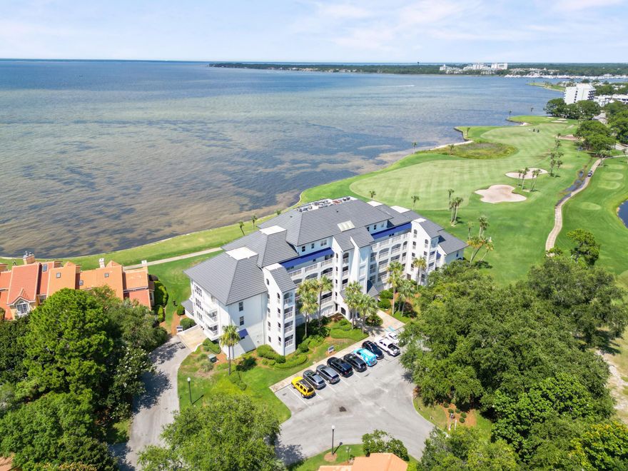 RARE OPPORTUNITY - ONLY UNIT IN THE BUIDLING FOR SALE -  Experience sophisticated living in this 3 bedroom, 4 bathroom, 2,213 square foot, bayfront penthouse. A real hidden treasure within Sandestin Golf & Beach Resort(r). From your private balcony, take in serene sunrises, stunning sunsets, and the gentle activity of boats, birds, and even playful dolphins. Designed to maximize natural light, the open living area features luxury vinyl plank flooring, custom window treatments, high ceilings and is one of only three in Players Club on the Bay, a boutique building with just 28 units. It provides a covered parking space, golf cart parking, additional ground-level storage, and access to a private pool and a communal patio for gatherings. Enjoy breathtaking views of the Choctawhatchee Bay and the 9th Fairway of the Linkside golf course from nearly every room in this fifth-floor condo. 

The main-level primary suite offers a true retreat with a spa-like bathroom featuring marble countertops, double sinks, walk-in shower and generous storage. Two upstairs bedrooms include views to the Bay and golf course and ensuite bathrooms. Recent upgrades and renovations include new flooring (2024), new HVAC (2023), fresh paint, new stainless steel appliances, and updated furnishings.

Players Club is meticulously maintained, with a new elevator (2022), a steel metal tile roof (2023) rated for category 5 winds and extensive waterproofing improvements (2024). Both the Florida Structural Integrity Reserve Study and the Milestone Inspection have been completed.

This exceptional property offers easy access to world-class golf, dining, shopping, and the sugar-white beaches that make this area so sought after.

Sandestin Golf and Beach Resort features more than seven miles of beaches and pristine bay front, four championship golf courses, 15 world-class tennis courts, a 226-slip marina, a fitness center, spa and celebrity chef dining. Shop, dine and play at the charming pedestrian village, The Village of Baytowne Wharf and more. Inside the gates of the resort, residents enjoy a balanced lifestyle, spanning the 2,400 acres from the beach to the bay. The entire resort is interconnected by miles of pedestrian, bike and golf cart paths that weave through groves of live oaks, meandering past natural lagoons, fountains, man-made lakes, and meticulously landscaped fairways. Excluding furniture but can be separately negotiated. Listing agent is related to the seller.
