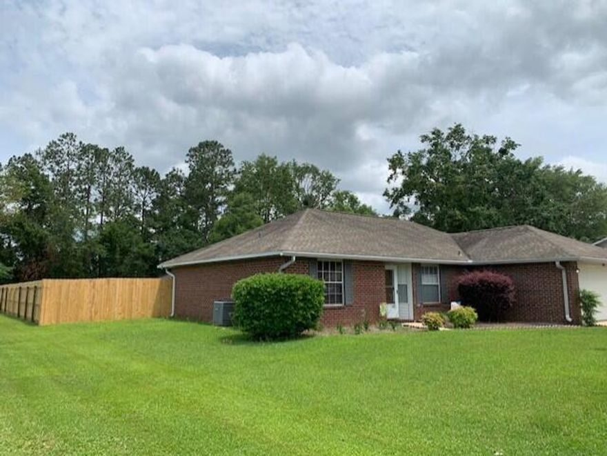 Well maintained Home on 1 acre, including beautiful updated  Appliances , Hardwood Flooring in Bedrooms, Laminate Wood in Great Room & Formal Dining, Tile in all wet areas, Covered Patio with a Hot Tub and Outdoor Kitchen area, Hot Tub has brand new cover & well maintained, Workshop area with a 24x30 Garage, Workbench, A/C, 30 amp RV Hookup outside the Garage, 20x20 Garage with Double Garage Doors, Huge Privacy Fenced Back Yard, Irrigation Well & Sprinkler