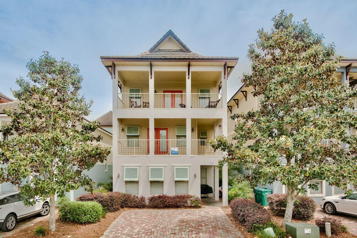 Situated behind the gates of desirable Villages of Crystal Beach, this remarkable three-story beach house is in pristine condition and ready for a new owner. With five bedrooms and two separate living spaces, this is the ideal investment opportunity. This home has been carefully cared for and recent updates include exterior and interior painting and new flooring throughout the second and third floors. Upon entering the home, you are greeted with an open living room that flows seamlessly to the fully equipped kitchen and separate dining area. The first floor is also home to a guest room with a king bed, a full bathroom and a spacious laundry room with a separate refrigerator. Located on the second floor, the master bedroom suite is truly one-of-a-kind and boasts its own private balcony