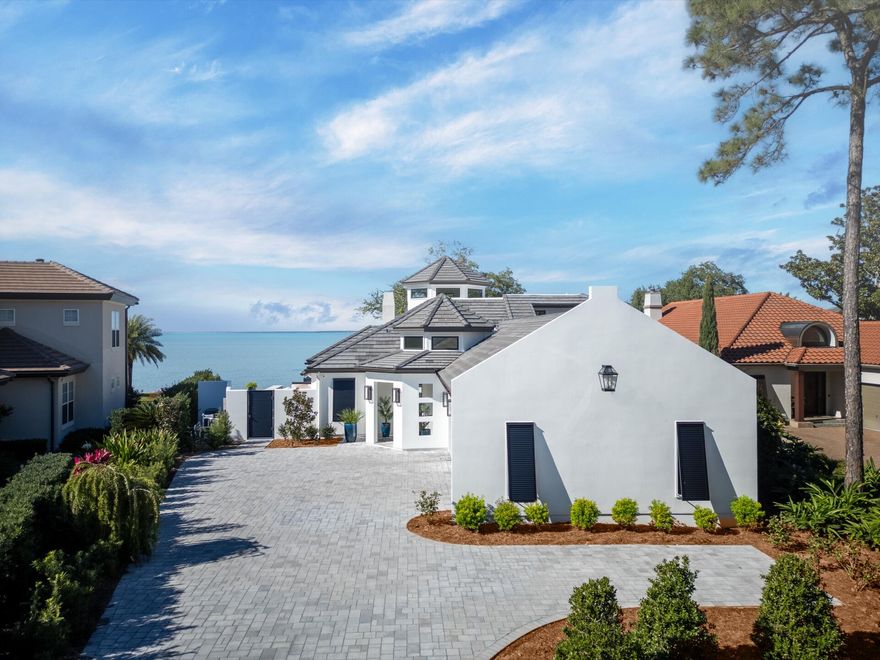 BAYFRONT MASTERPIECE BEHIND THE GATES OF BURNT PINE AT SANDESTIN. HOME HAS UNDERGONE A NEARLY 3 YEAR RENOVATION AND HAS BEEN COMPLETELY REBUILT DOWN TO THE FOUNDATION AND STUDS AND IS LIKE A NEW HOME. NEW TILE ROOF, HURRICANE RESISTANT WINDOWS, STUCCO WALLS, INTERIOR DRYWALL, FLOORING, NEW PLUMBING, LED LIGHTING & LIGHT FIXTURES, DUCTS, FURNACES, AND HVAC'S, POOL, SEAWALL AND DOCK. SMART HOME is 4333 SQ. FT. 4 BEDROOM AND 4 FULL BATHS AND 2 HALF BATHS. KITCHEN HAS TOP OF THE LINE APPLIANCES, PANTRY, COFFEE BAR. MEDIA ROOM WITH 120' PROJECTION TV, 12 FT. SLIDING GLASS DOORS OPEN TO THE BAY AND OUTDOOR KITCHEN AND FIREPIT. FIRST FLOOR PRIVATE MAIN SUITE HAS HIS & HER CLOSETS AND BATHROOM HAS A WET ROOM FOR THE SHOWER & TUB. ALL BEDROOMS HAVE THEIR OWN FULL BATH.  HOME HAS IT ALL!!!