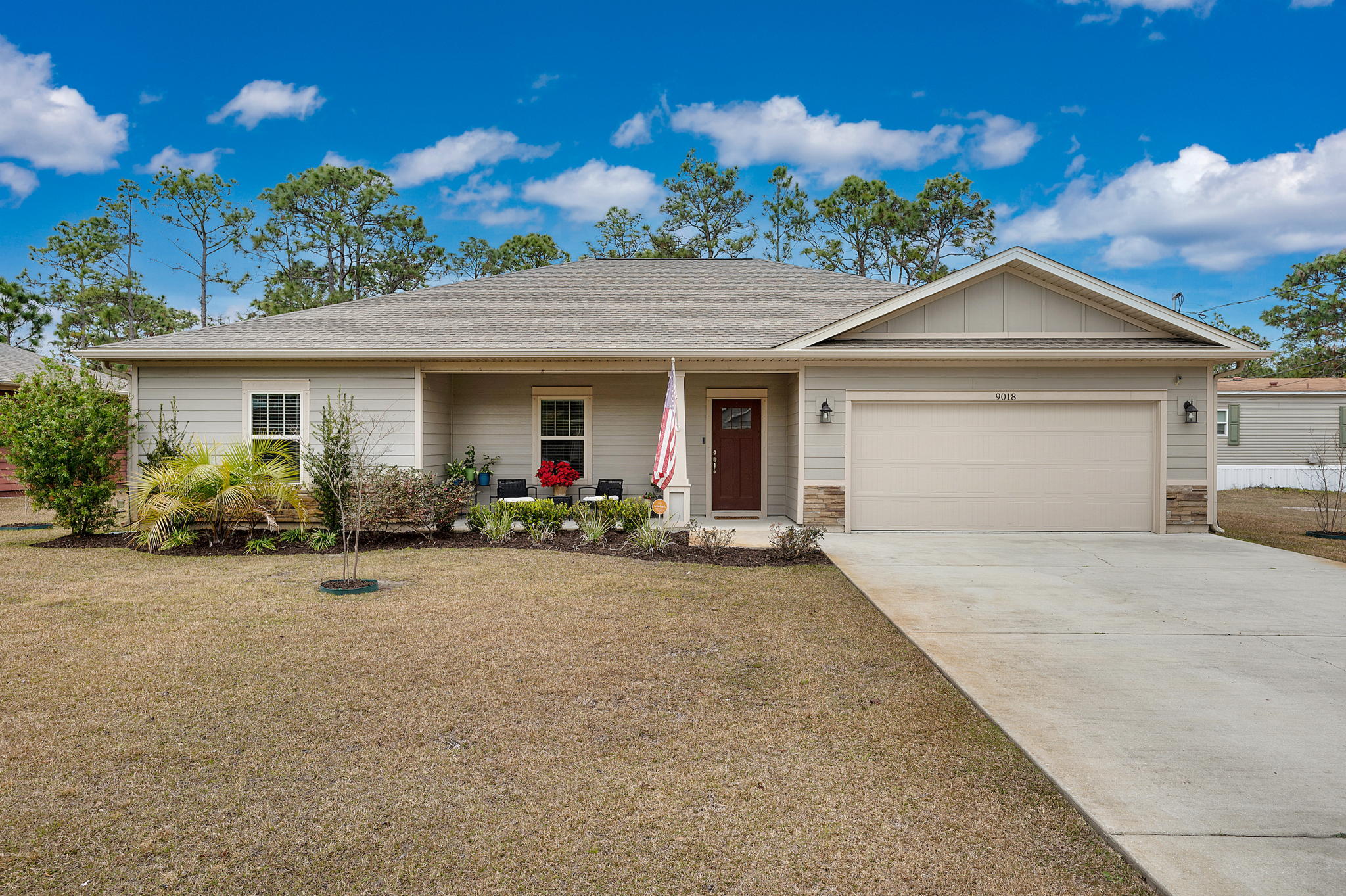 This light, bright, move-in ready home will wow you! With 4 bedrooms and a large, open floor plan, you'll find plenty of space in this beautiful home. Engineered wood flooring greets you and flows throughout the spacious living area. The kitchen features beautiful cabinetry, granite countertops, and stainless steel appliances to please any chef. The large master suite features enough room for king-sized furniture, a huge master bathroom with double vanity, and a great walk-in closet. Stepping outside, the backyard and open patio is perfect for backyard get-togethers. The fence is not the end of the property line either! Through the gate is plenty more yard to explore. Schedule your appointment today, don't miss out on this one!