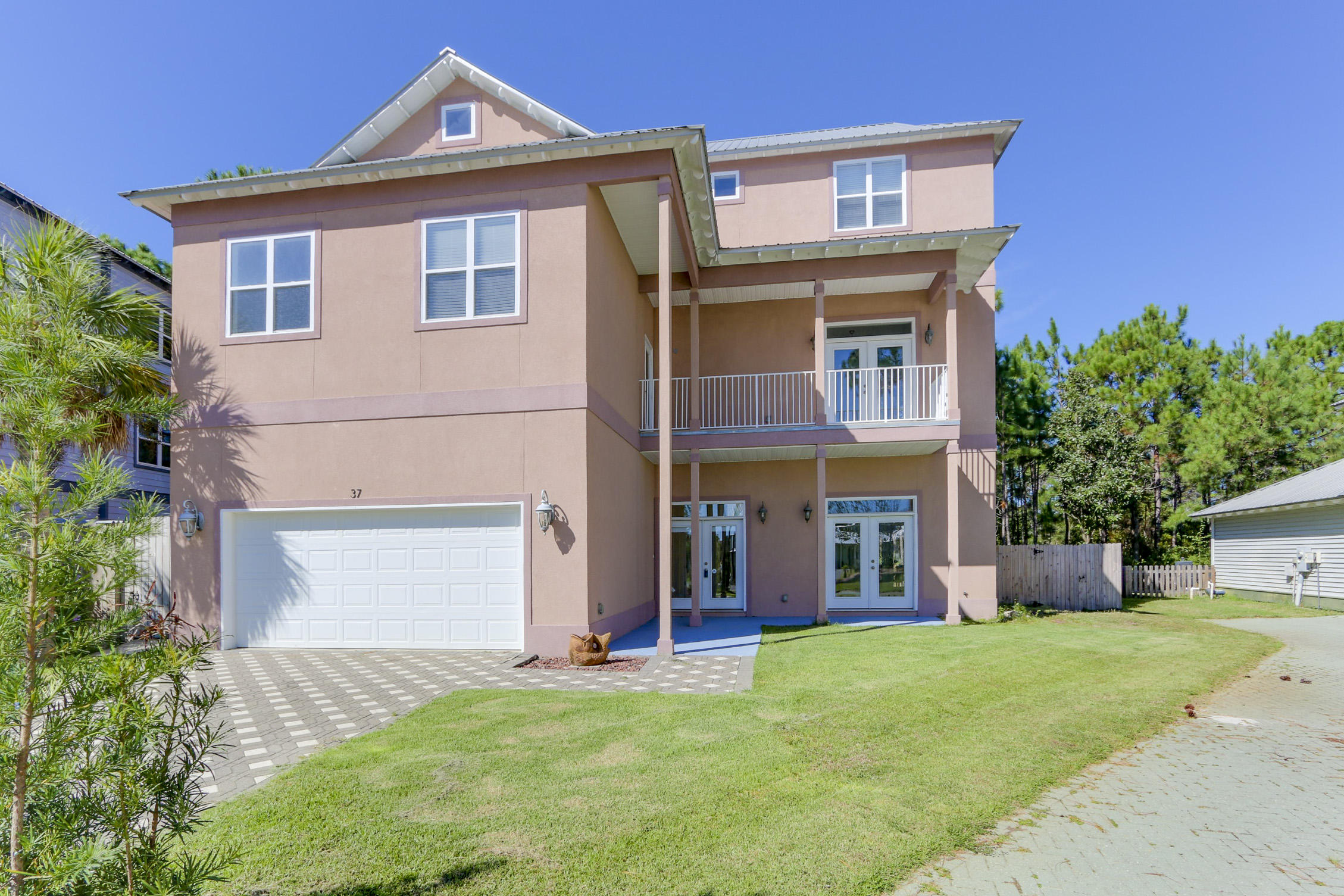 WOW! This is an amazing 6 bedroom, 4.5 bath home that is 3,538 SF and located in the well sought out community of Cypress Breeze Plantation. The community is very near Ed Walline beach access, Gulf Place and all the shops, art galleries, world class restaurants and art and music festivals that 30A has to offer. Features of this 3 story home include an elevator, raised ceilings, tile throughout the living areas and carpeted bedrooms. There is a patio off the living room leading to the large, private fenced back yard. The kitchen has a pantry, stainless steel appliances and lots of counter and cabinet space. The 2nd floor features a family room with a cabinet/countertop that has a sink and space for a mini fridge. There is a master suite on the 2nd and 3rd floors, each with private