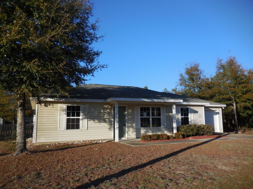 REO. This home has been Chinese drywall remediated and is ready for you to finish it to your heart's desire! The living room has an attractive vaulted ceiling and is open to the dining area and the tiled kitchen, which has a convenient pantry. The master suite features a large walk-in closet and beautifully tiled bathroom. Two other bedrooms and the guest bath (also tiled) are located on the other side of the house. An attached one car garage with laundry hook-ups finish off this lovely layout. The bathroom cabinets, bedroom closet doors, and a ceiling fan are currently stored in the garage. The large back yard will also please you with an open patio perfect for BBQs. Home is conveniently located just off Hwy 90.