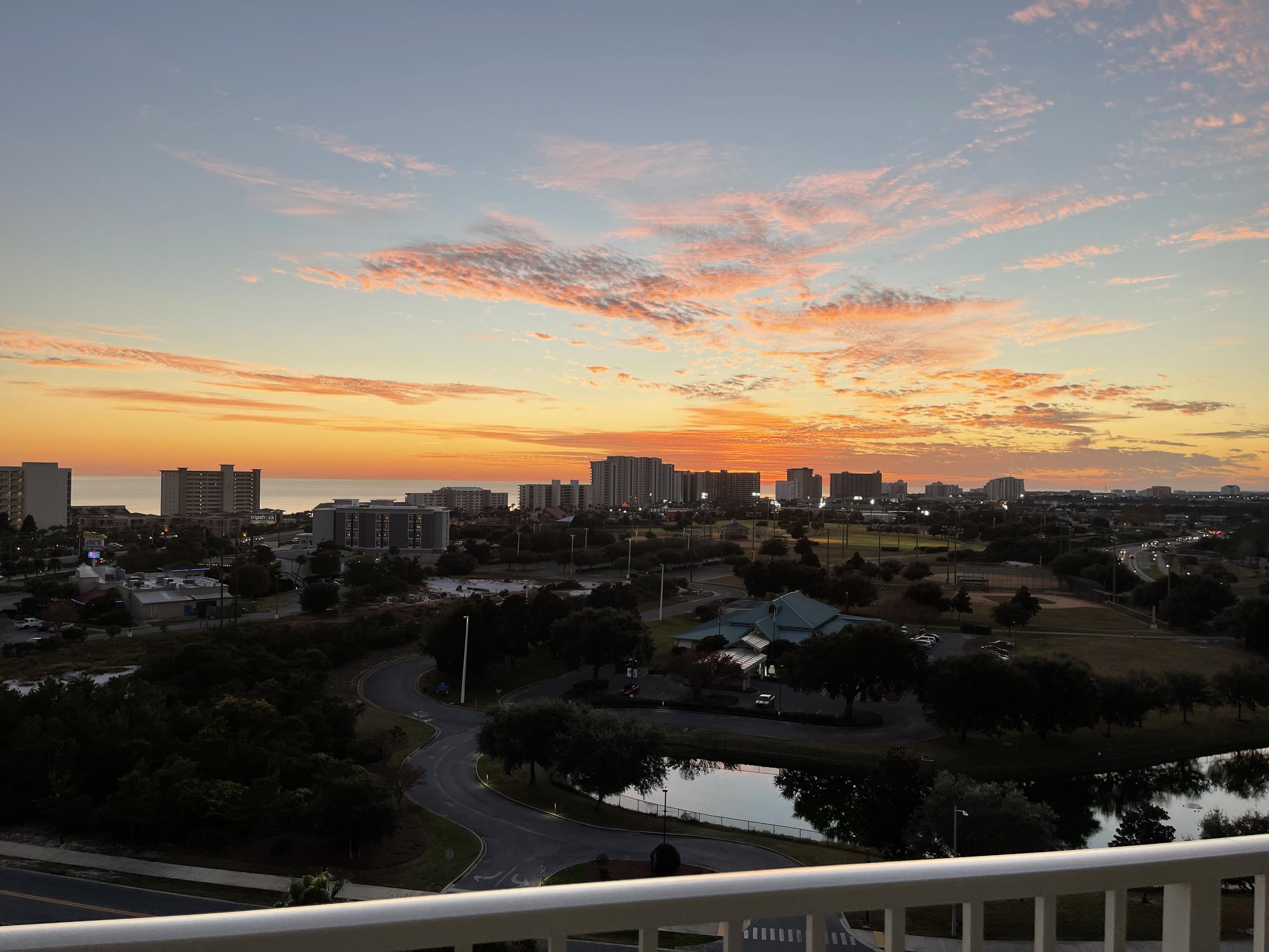 Watch the sunset from balcony 1, facing the gulf. Or watch the sunrise from balcony 2, facing the bay. Expansive gulf and bay views from each bedroom and dining room. Completely renovated, with new flooring, updated kitchen, and updated bathrooms. Centrally located within Destin, this corner unit is conveniently located as close as you can get to the front entry and parking lot. Great property to call home or to use as a vacation rental.