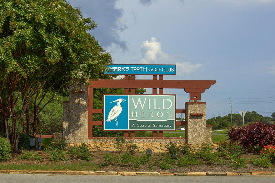 The best priced lot in Wild Heron to build your dream home on beautiful Meadowlark Way! Conveniently located between Pier Park and the East end of Scenic 30A, Wild Heron is 20 minutes from the Northwest Beaches International Airport. Residents of Wild Heron have access to Lake Powell, one of the largest of the rare coastal dune lakes in the region. The community has a boathouse stocked with canoes and kayaks for exploring the pristine waters, which run all the way to the Gulf of Mexico. For golf lovers, the centerpiece of the community is the award-winning Shark's Tooth Golf Course and Club, located alongside the lake and designed by one of the world's best golfers, Greg Norman.