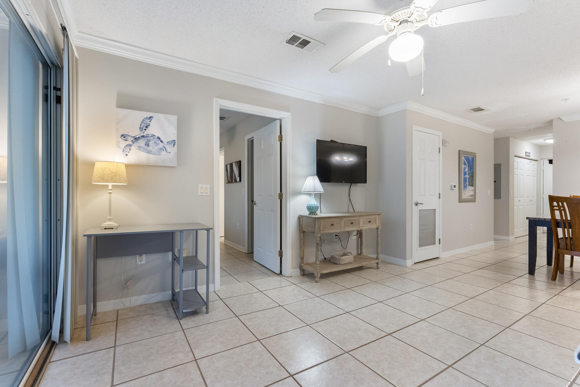 Upgraded Ground floor unit steps away from the pool and clubhouse! Ready to move in: 2 bedroom, 2 bathroom condo in desirable Florida Club community with many amenities! Double glass doors lead to fully screened-in porch with storage closet. Fabulous large tiles throughout living area and master bedroom. Light plank flooring in second bedroom. 2021 HVAC unit, 2021 commercial grade water heater. Close to MidBay bridge, Eglin AFB, EOD school, Niceville schools, shopping and short drive to the beautiful Emerald Coast beaches!