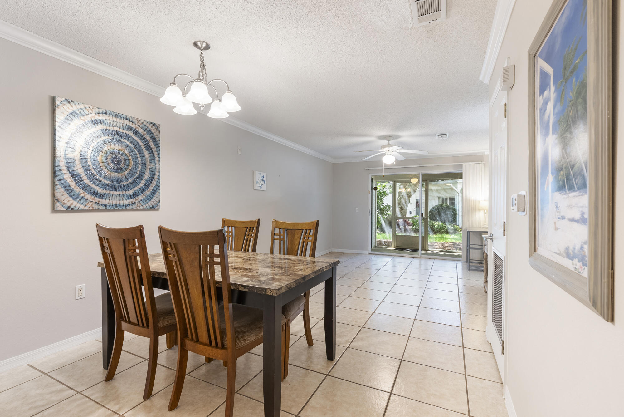 Upgraded Ground floor unit steps away from the pool and clubhouse! Ready to move in: 2 bedroom, 2 bathroom condo in desirable Florida Club community with many amenities! Double glass doors lead to fully screened-in porch with storage closet. Fabulous large tiles throughout living area and master bedroom. Light plank flooring in second bedroom. 2021 HVAC unit, 2021 commercial grade water heater. Near the MidBay bridge, Eglin AFB, EOD school, Niceville schools, shopping and short drive to the beautiful Emerald Coast beaches!