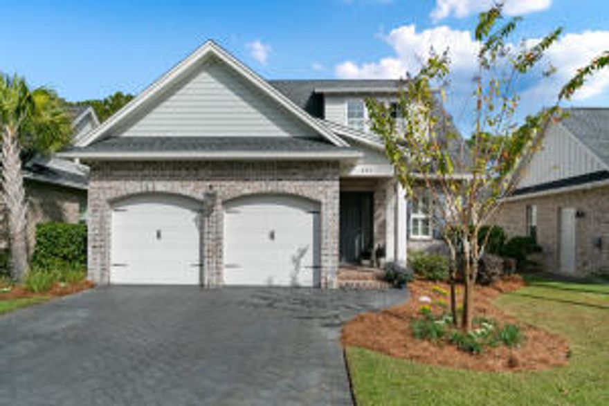 This expansive home built by Huff Homes  features brick & hardie board siding, insulated windows, wind load rated insulated garage door. Spacious floor plan with 10 ft ceilings on the main floor & 9 ft on the second floor. Wide plank wood floors throughout the home as well as wood shutters on most interior windows. Screen porch with ceiling fan.  For the chef in the family we welcome you to a well appointed kitchen with a large center island for gatherings and entertainment, quartz countertops, 42 upper cabinets with crown molding, soft close drawers and custom raised panels with concealed hinges and stainless appliances that include a refrigerator, dishwasher, microwave and dual fuel range with gas cooktop and electric oven . There are 2 pantry's and one is a a larger walk in Pantry