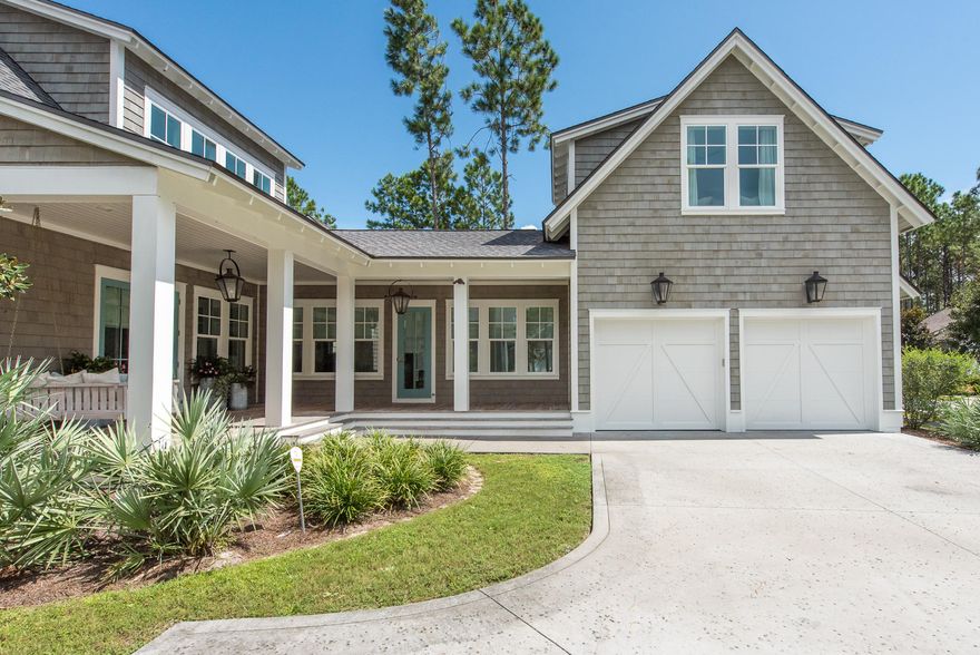 This gorgeous home located on the neighborhood of Watersound Origins golf course, welcomes owners and guests with it's large L-shaped front porch entrance. The beautiful french doors lead to the homes spacious main living area. The main level of the home boasts 12' ceilings and large windows bathing the rooms in beautiful natural light. A neutral color palette, white oak floors, designer furnishings and custom window treatments, create a bright and elegant feel. The home's kitchen is filled with top of the line finishes such as Wolf appliances, built in refridgerator, custom tile backsplash, over-sized quartz island with seating for 5, and a cozy breakfast nook with built-in benches.