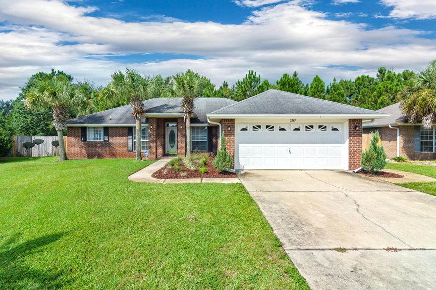A hidden gem. Complete with 2-car garage, this brick home features updated aesthetics and a neutral palette, while situated on an over-sized, corner lot with little traffic. From the foyer, you'll find a dinning area to the right and bonus room or office space to the left. A wood-burning fireplace, vaulted ceiling, and other architectural features highlight the living room. Kitchen boasts a breakfast bar as well as a separate seating area with abundant natural light. The master suite of your new home's split floor-plan offers a private entryway to the pool and patio via French doors, as well as his & her closets. Master bath is further equipped with separate vanities, shower, garden tub, and water closet. The exterior, landscaping, and pool (new liner 2016) are all well maintained.