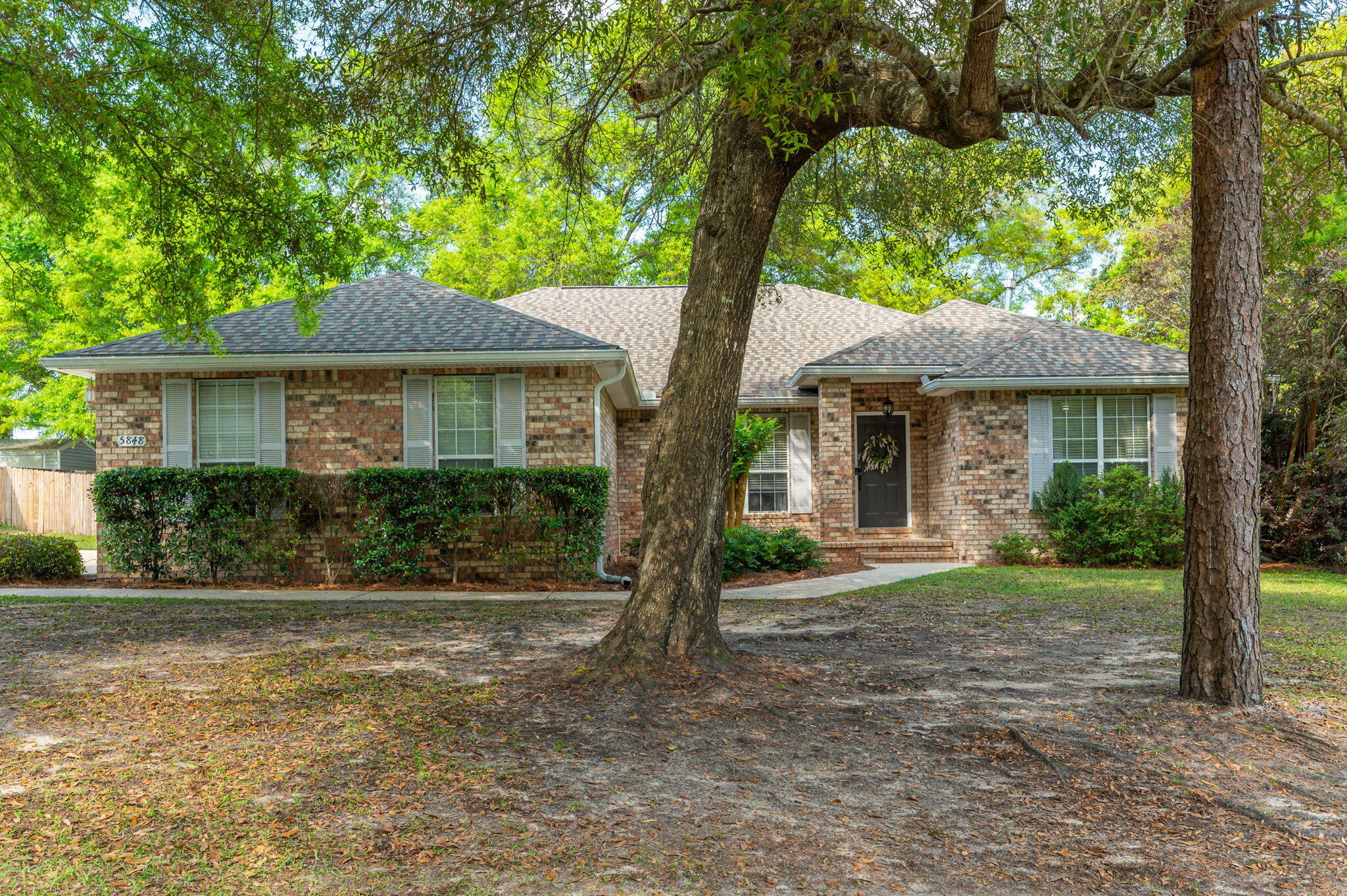 Seeking a larger residence? This property, situated in the esteemed Silver Oaks subdivision, offers convenient access to a community pool, thereby eliminating the need for individual pool maintenance. The property has undergone several significant updates, including the installation of a new roof in 2022, new flooring in 2023, a renovated master bathroom in 2019, and new carpeting in bedrooms in 2017. The kitchen and breakfast area boast ample cabinetry and a desk space in the breakfast room. The lot is shaded, providing a serene ambiance, and the screened porch offers a tranquil setting for relaxation or enjoying morning coffee. This property showcases numerous attractive features, rendering it a must-see residence