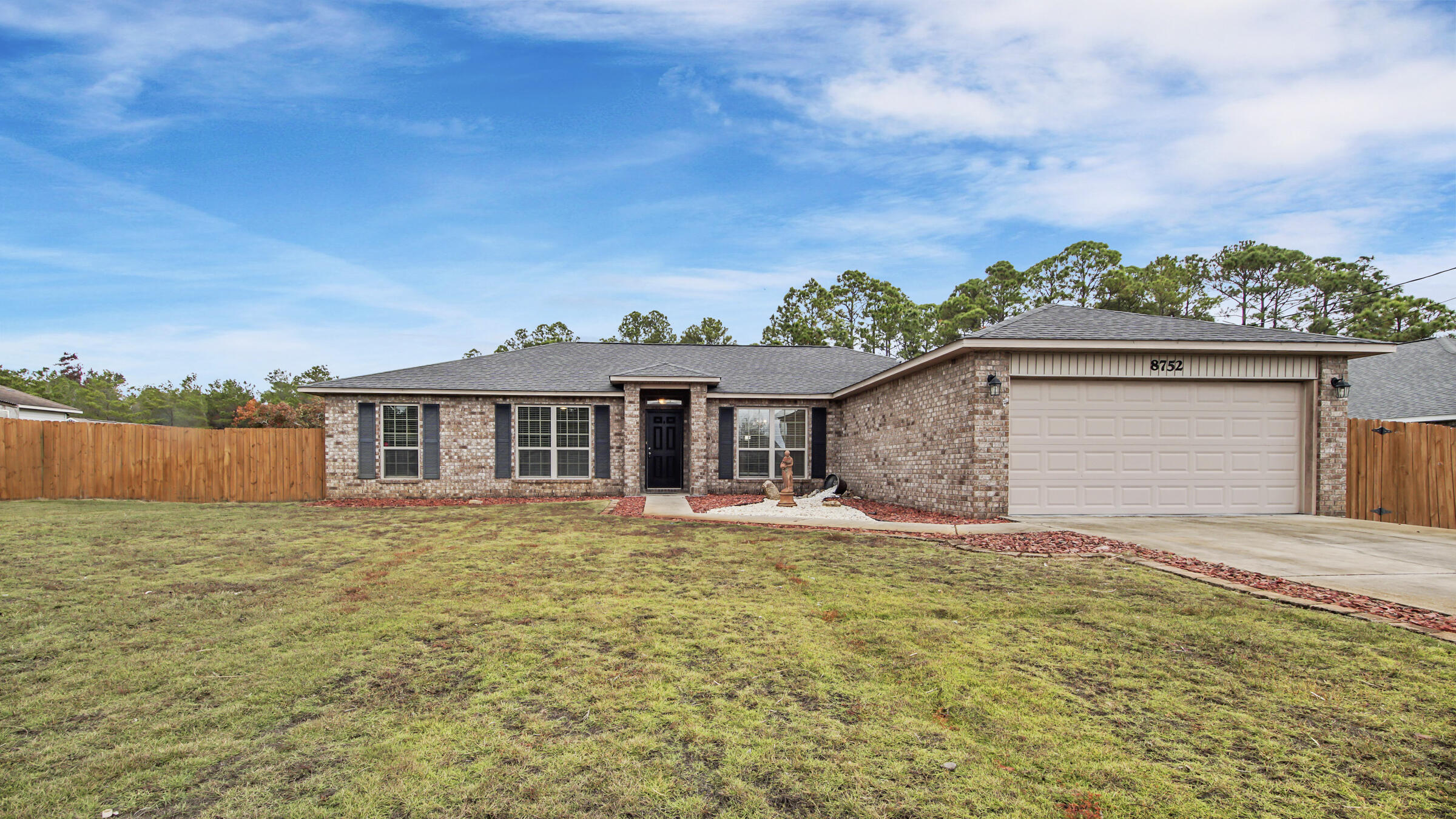 You must see this wonderful 4 bedroom 2 bath home in Navarre, sitting on a huge lot. This home offers a split bedroom floor plan with plenty of room for entertaining. You will love the LVP flooring and the island in the kitchen. The sliders off the family room lead to a large backyard with a privacy fence. Make your appointment to come see it today.