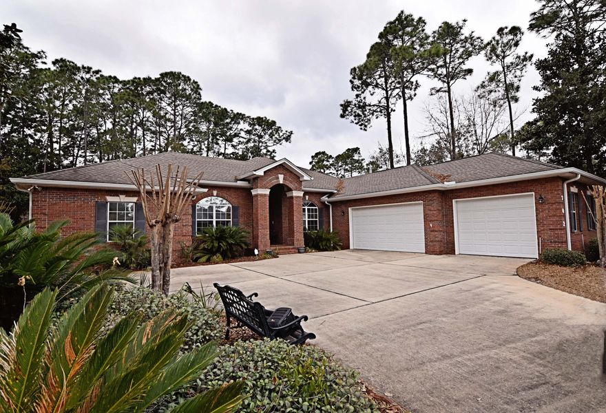 Spacious 4bed/3bath brick home with 3-car garage on .45 acre cul-de-sac lot in the lovely Bayshore Place neighborhood. 2016 upgrades include: 16 SEER HVAC system, whole-house water filtration system and tankless hot water heater. High ceilings, crown, recessed lighting, bull-nosed corners, Hunter Douglas wood blinds and tile flooring found throughout. Floorplan includes: Formal dining area, 2 living areas, gourmet kitchen, 3 full baths, spacious master suite and 3 sizable additional bedrooms. Kitchen is outfitted with: stainless appliances, 2 ovens and gas range, an abundance of maple cabinets with under-cabinet lighting, granite counter-tops, wine fridge, built-in pantry, breakfast bar &